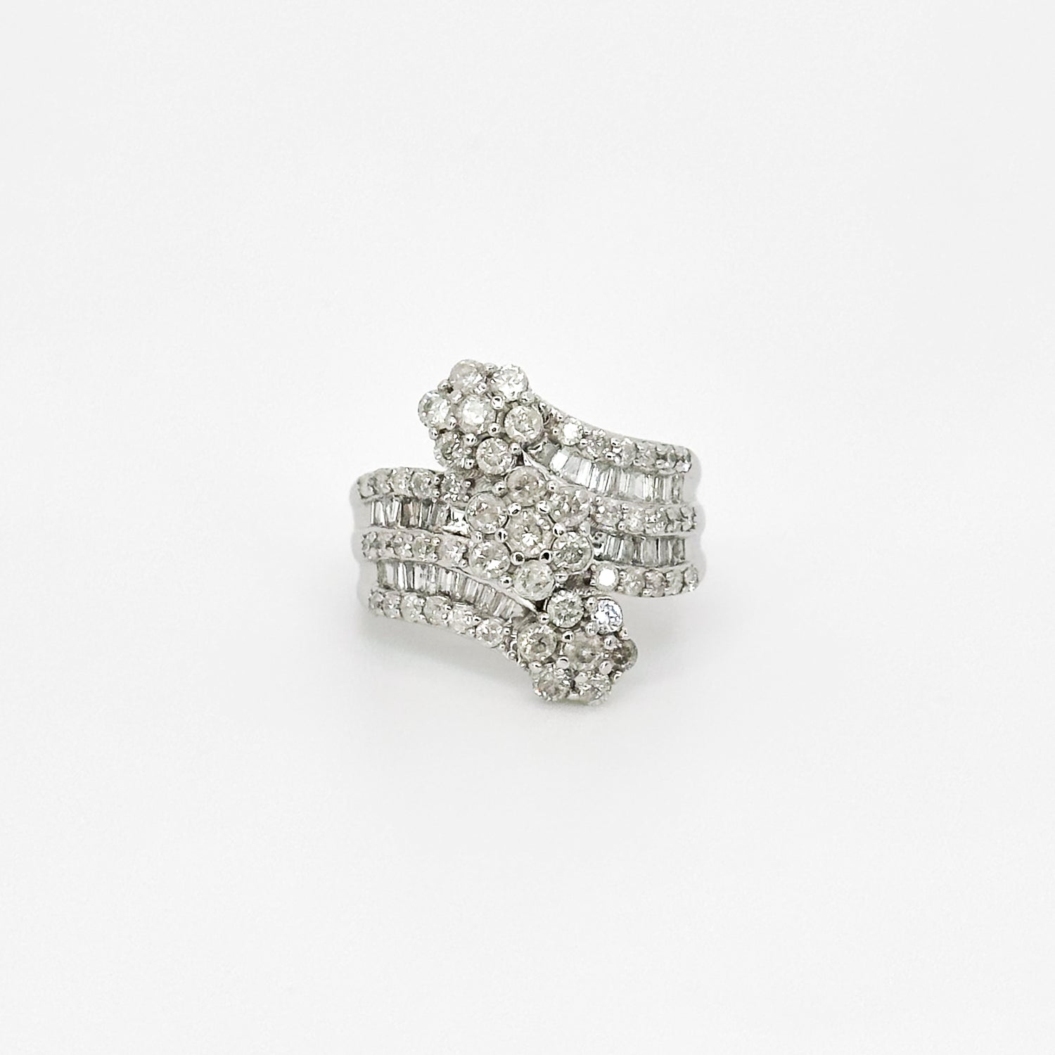 Three Daisy Clusters Diamond ring