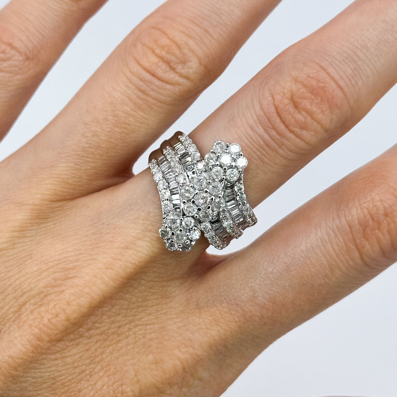 Three Daisy Clusters Diamond ring