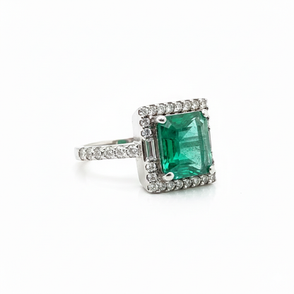 Emerald Cut Emerald &amp; Diamond Halo Ring