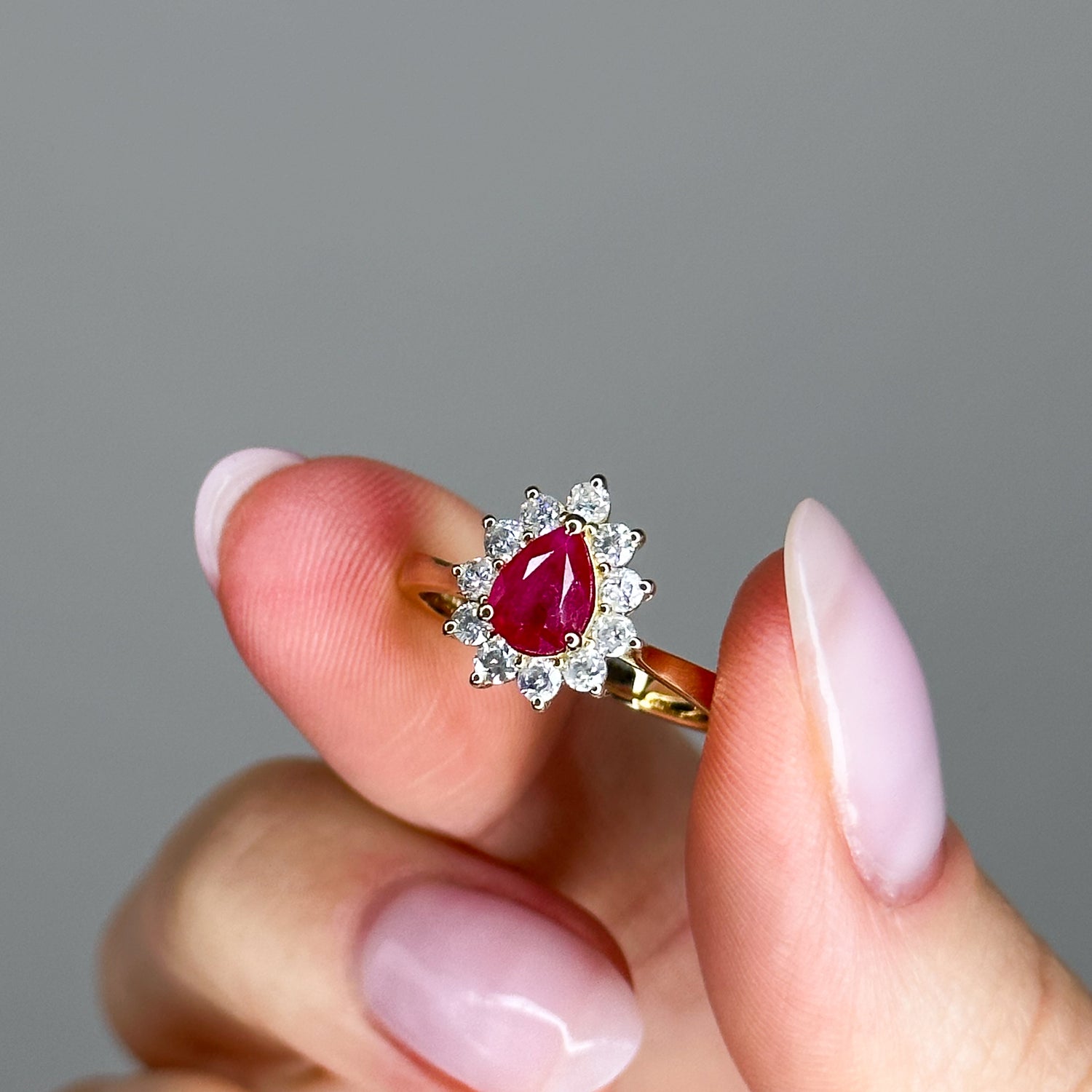 0.80ct Pear Shape Pink Ruby Ring with Diamond Halo