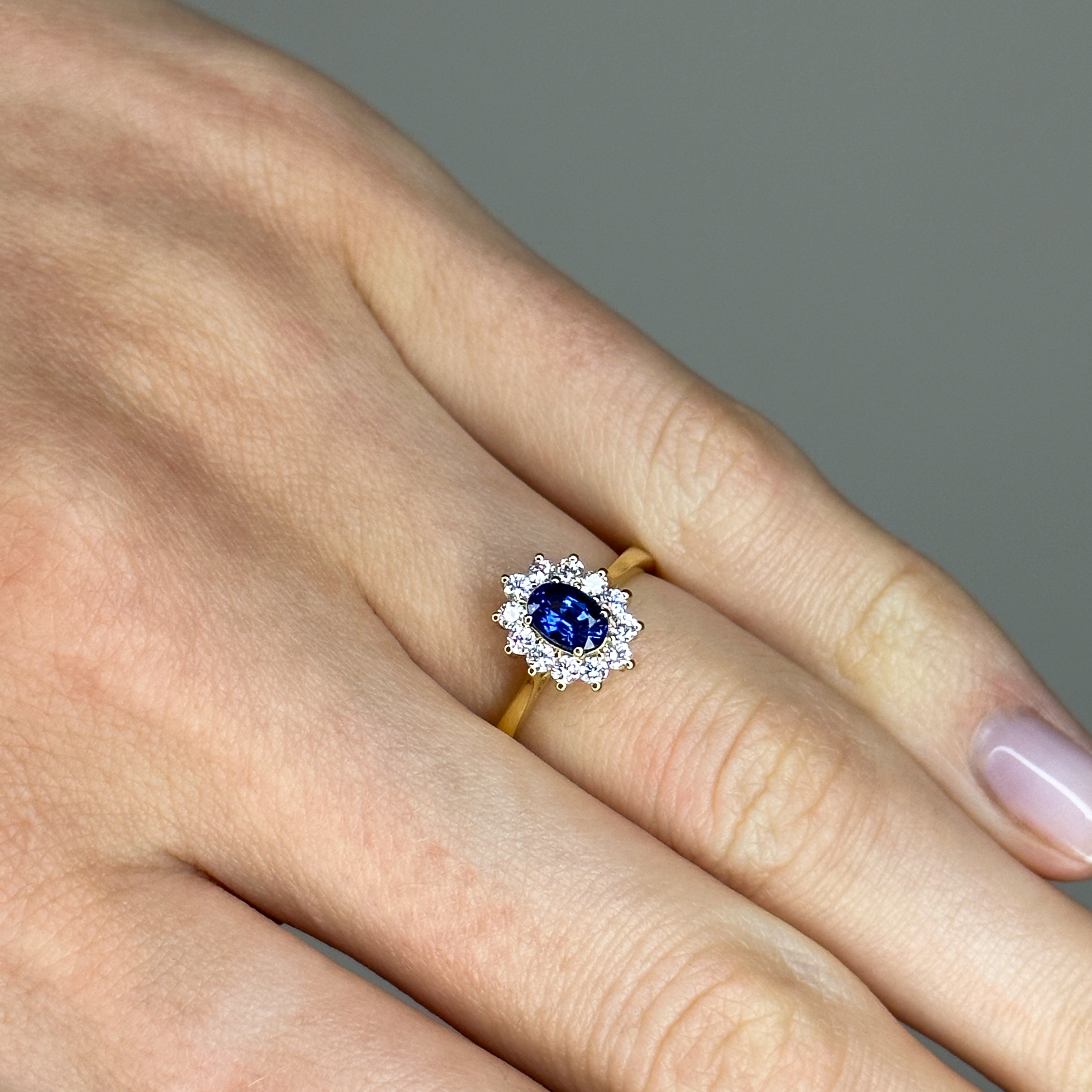 Oval Sapphire Ring with Diamond Halo