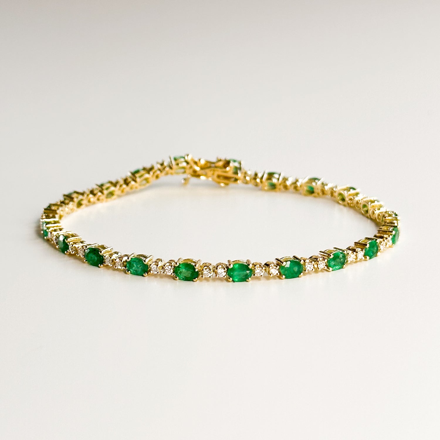 Gold Bracelet with Emeralds and Diamonds