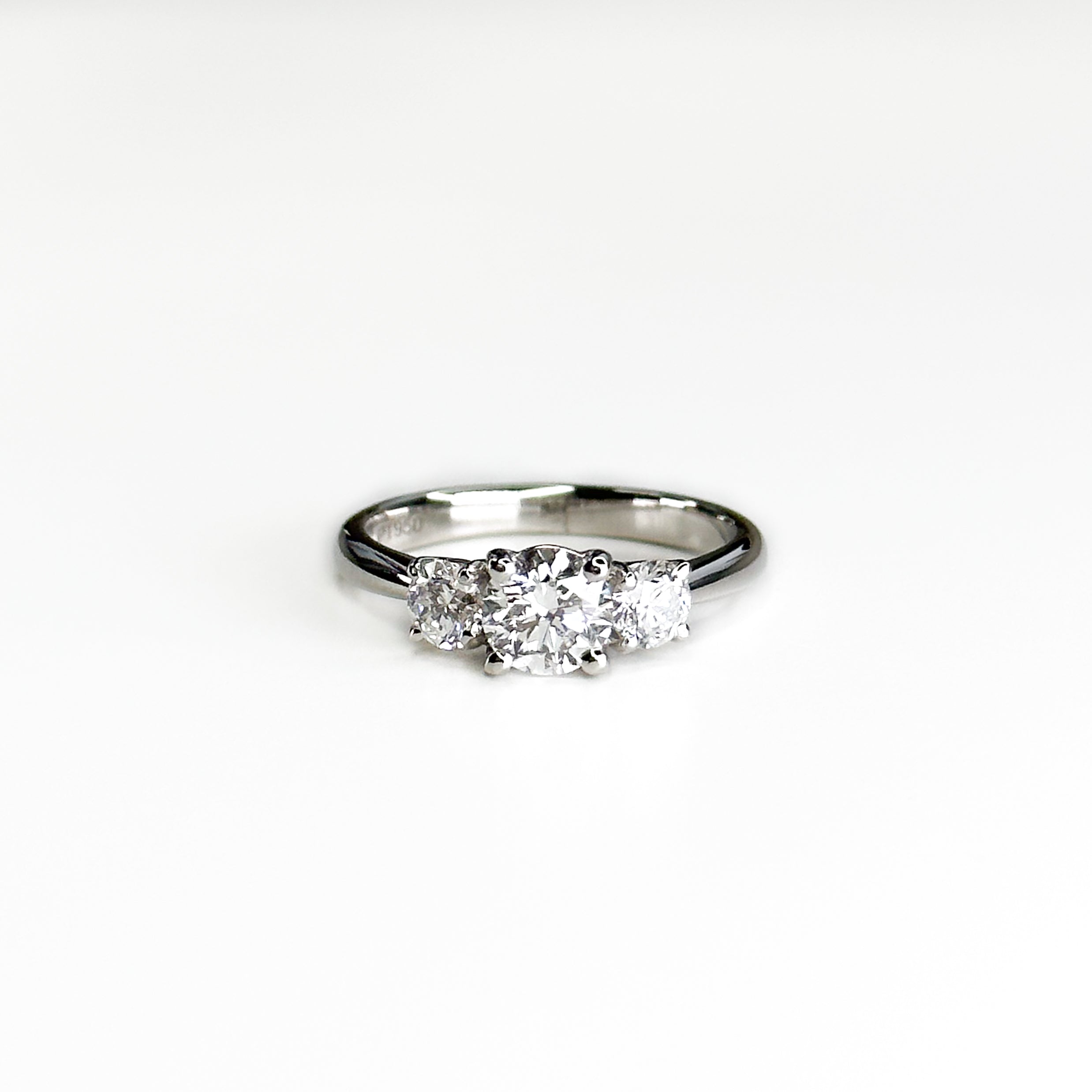 Diamond Trilogy Ring with 0.70ct Round Centre Stone