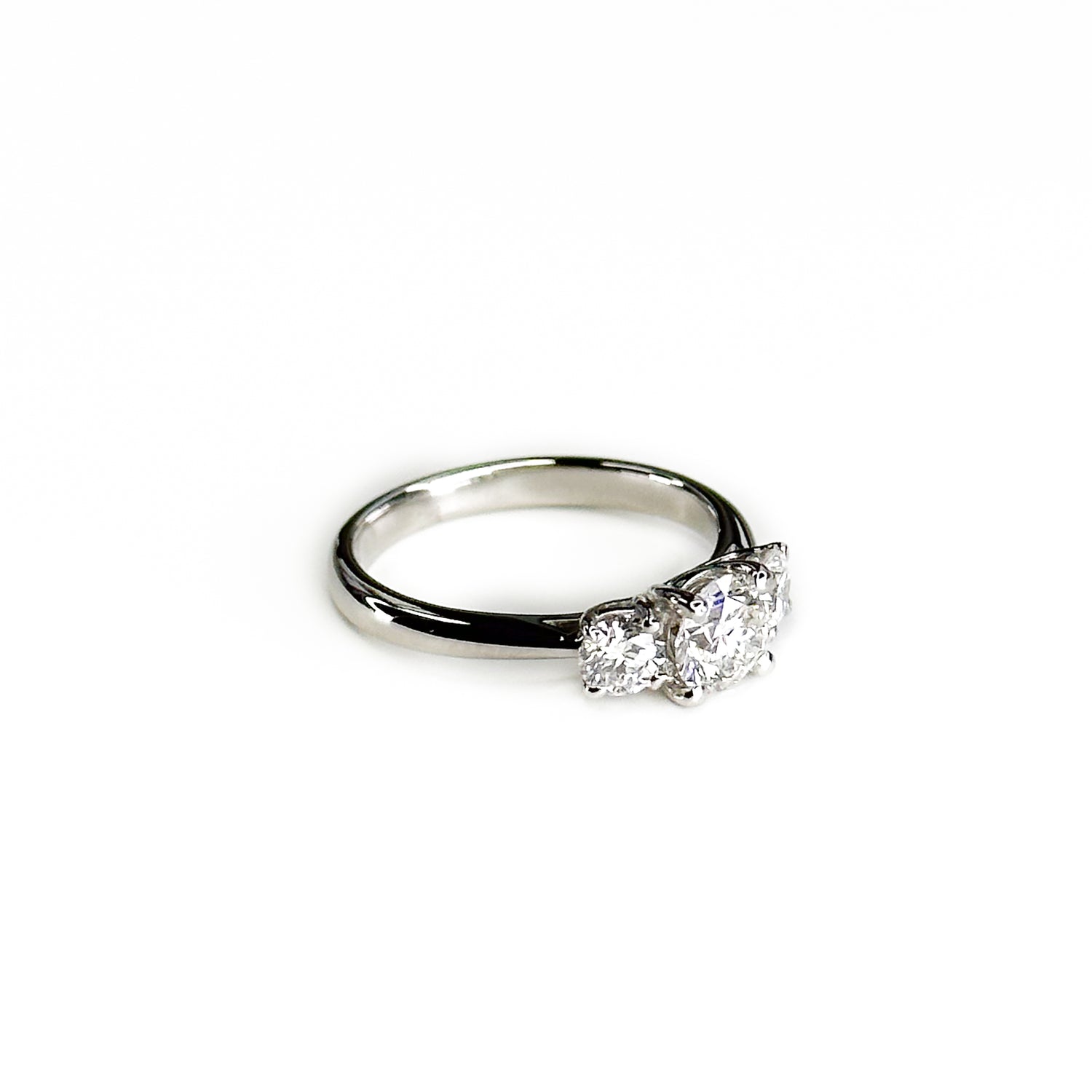 Diamond Trilogy Ring with 0.70ct Round Centre Stone