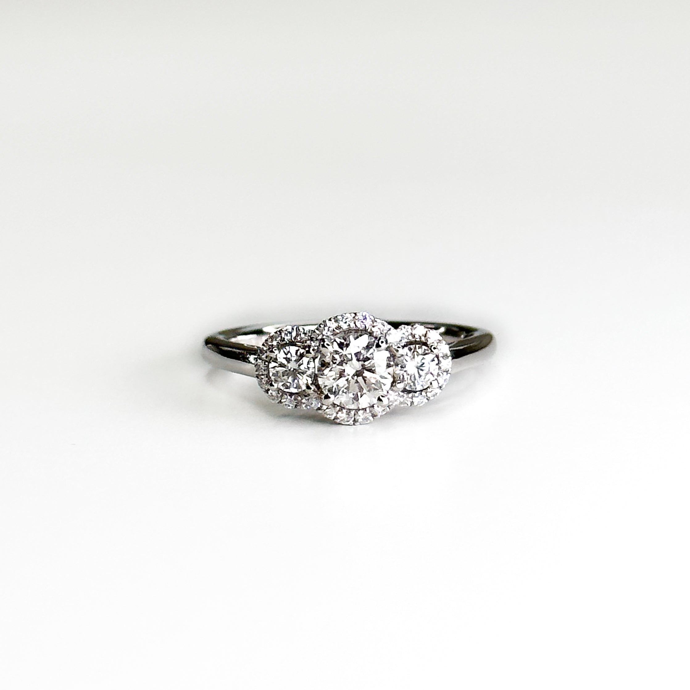 Diamond Trilogy Ring with 0.51ct Round Cut Stone