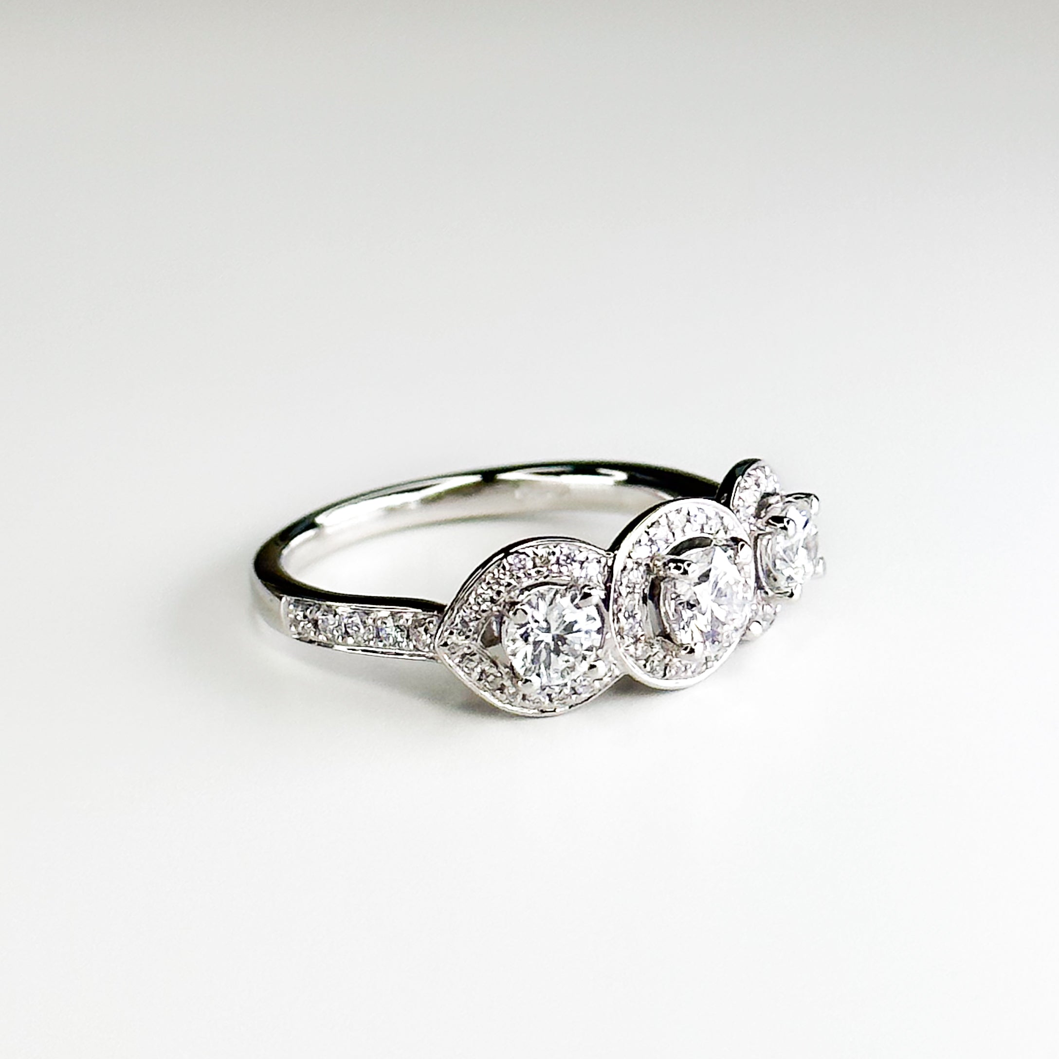 Diamond Trilogy Ring with 0.68ct Centre Stone