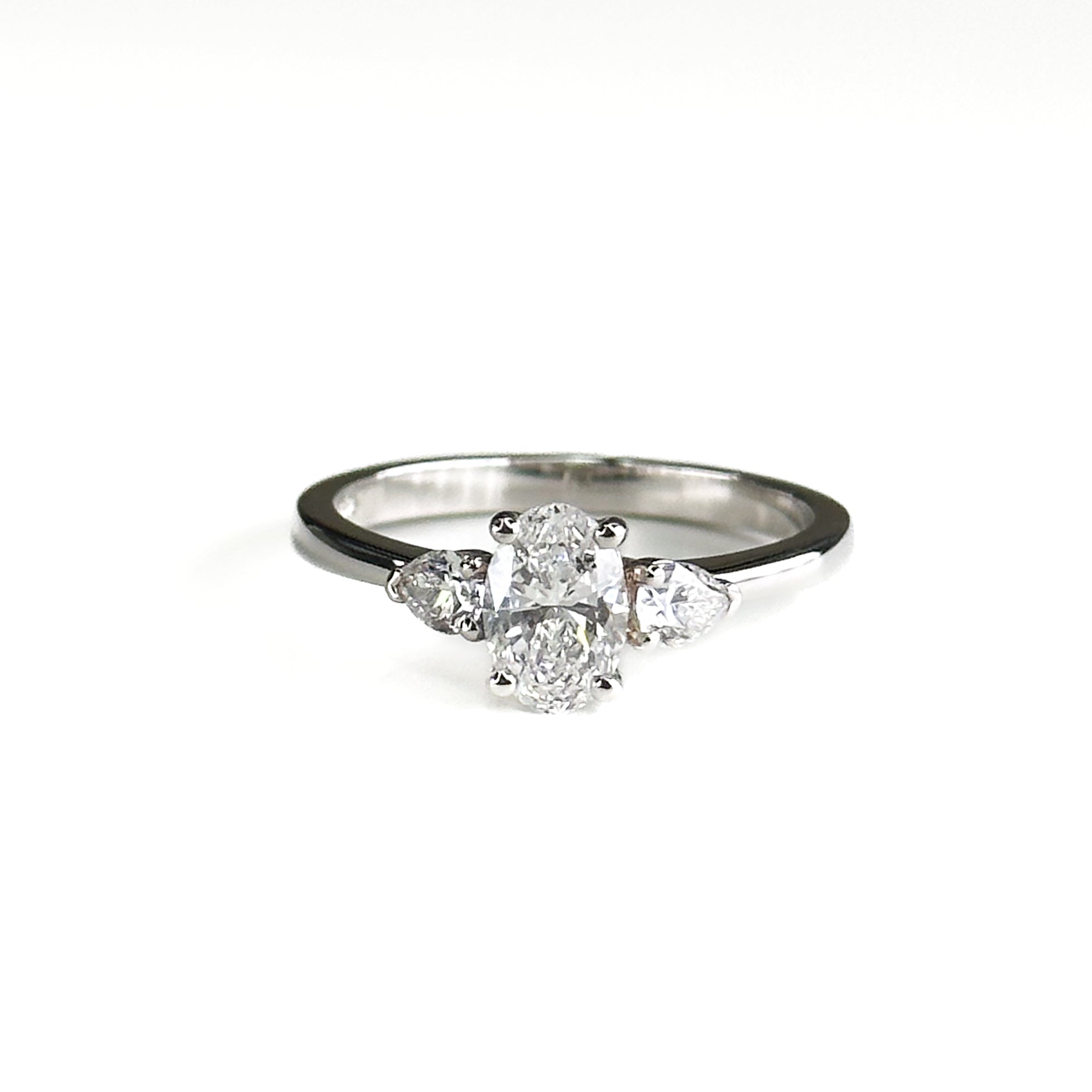 Diamond Trilogy Ring with 0.70ct Oval Centre Stone