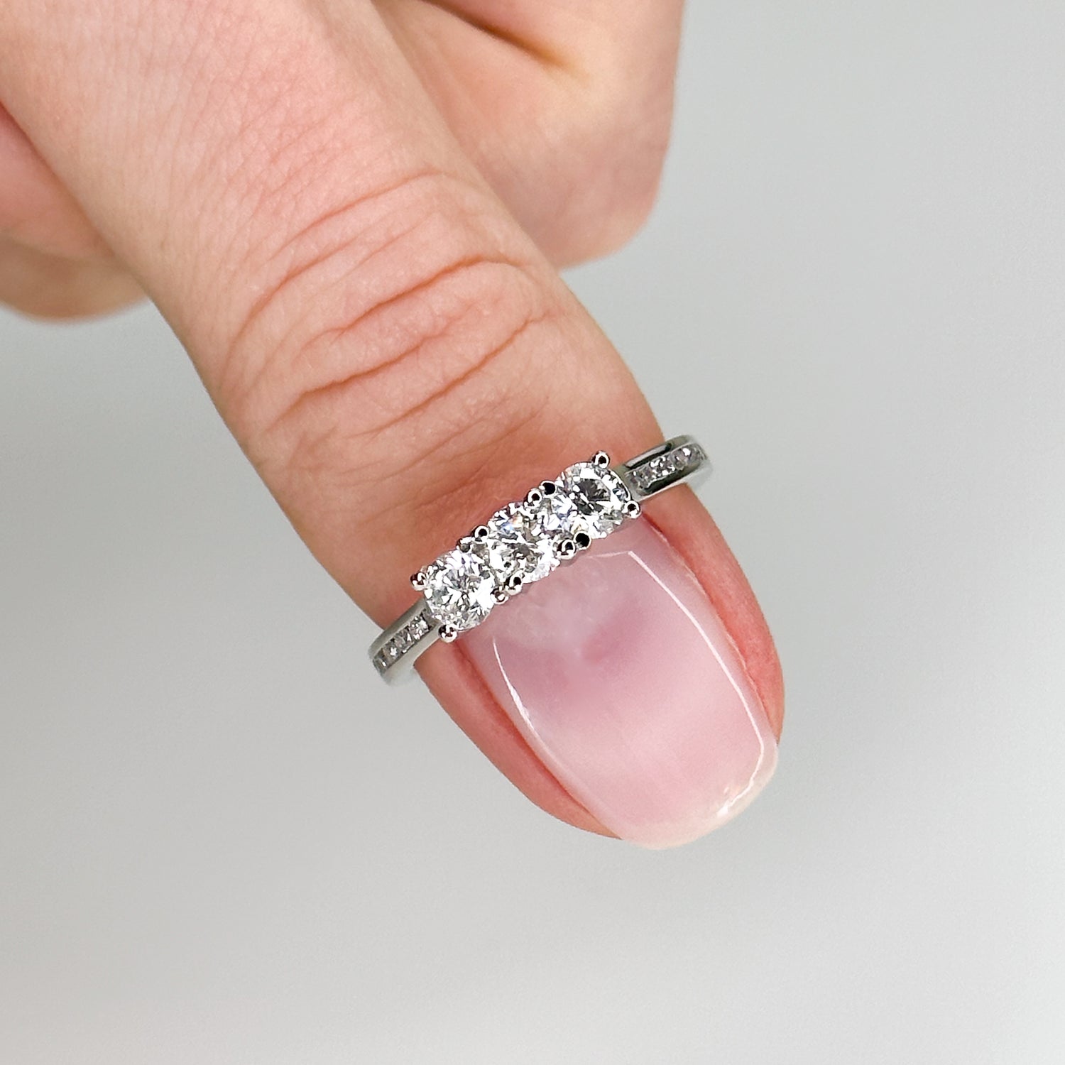 Diamond Trilogy Ring with 0.75ct Round Centre Stones