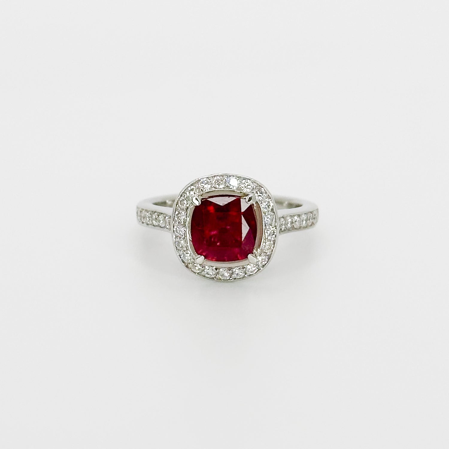 Ruby Ring with Diamond Halo in Platinum