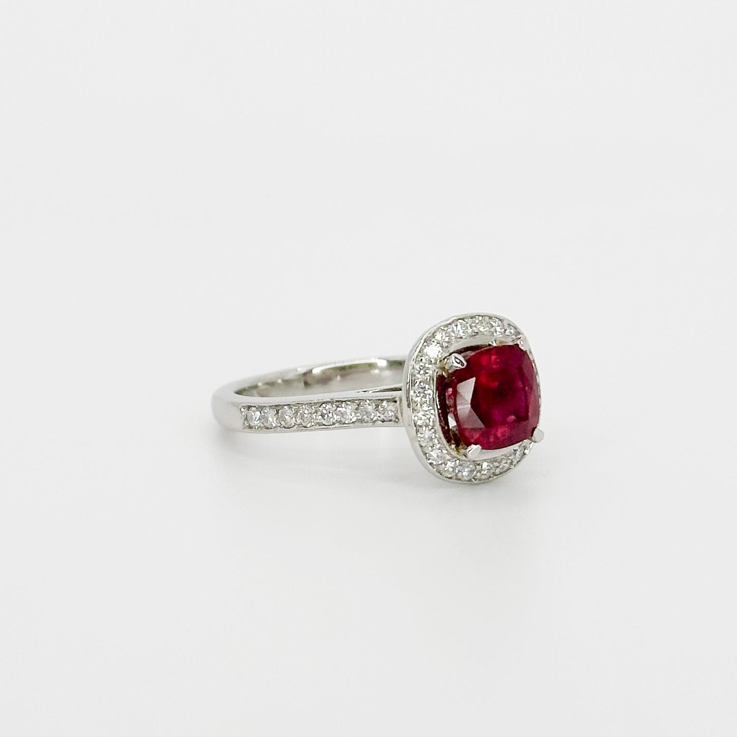 Ruby Ring with Diamond Halo in Platinum