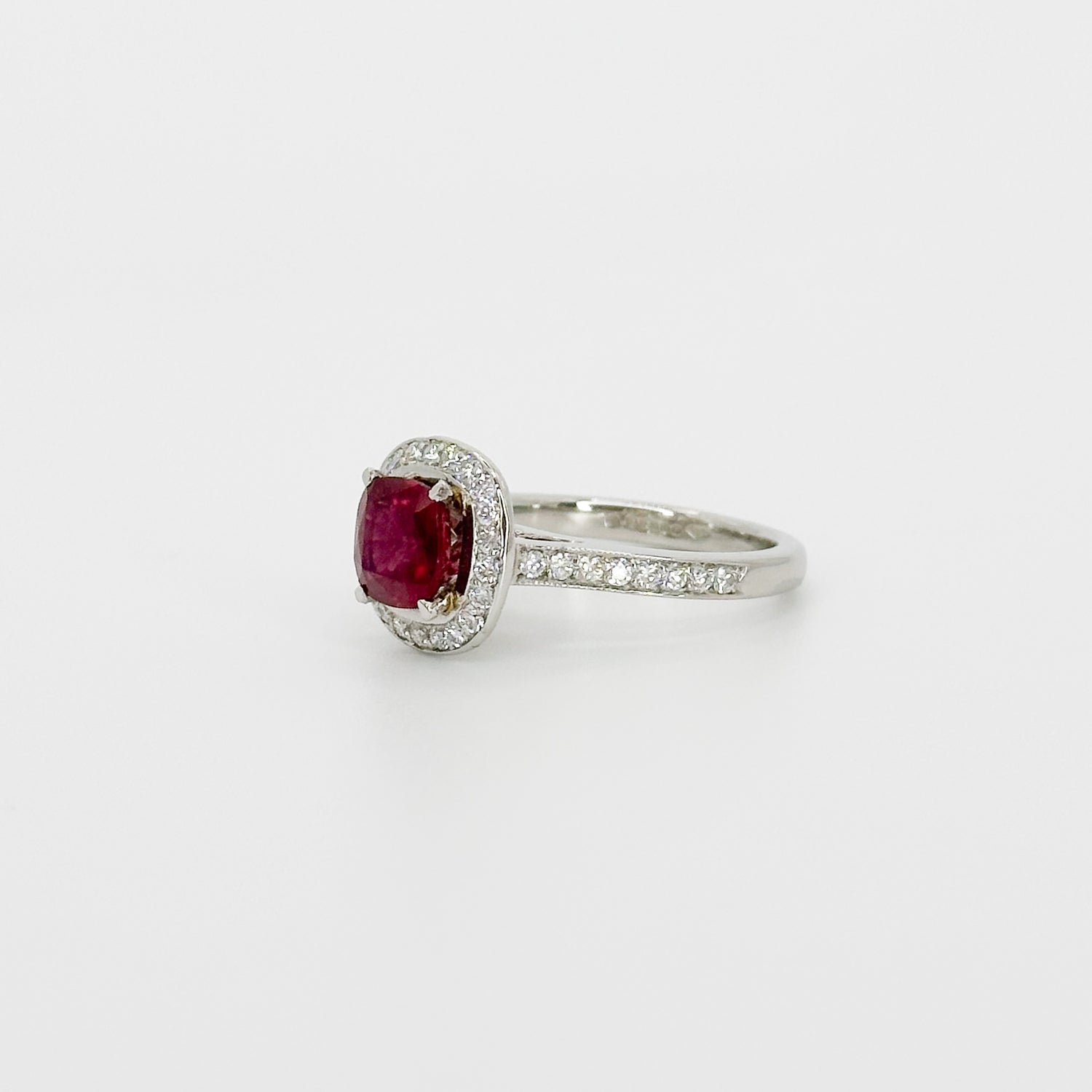 Ruby Ring with Diamond Halo in Platinum