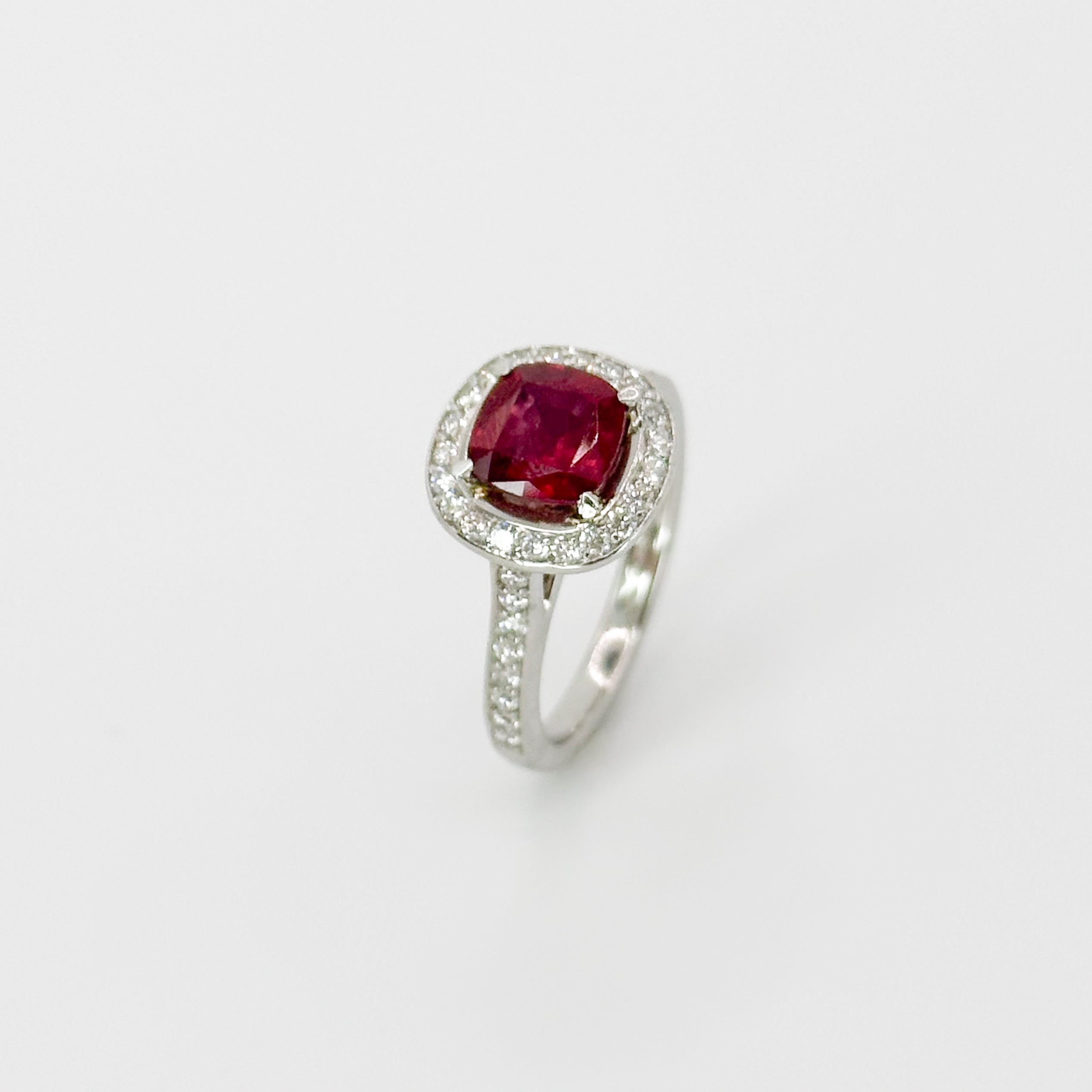 Ruby Ring with Diamond Halo in Platinum