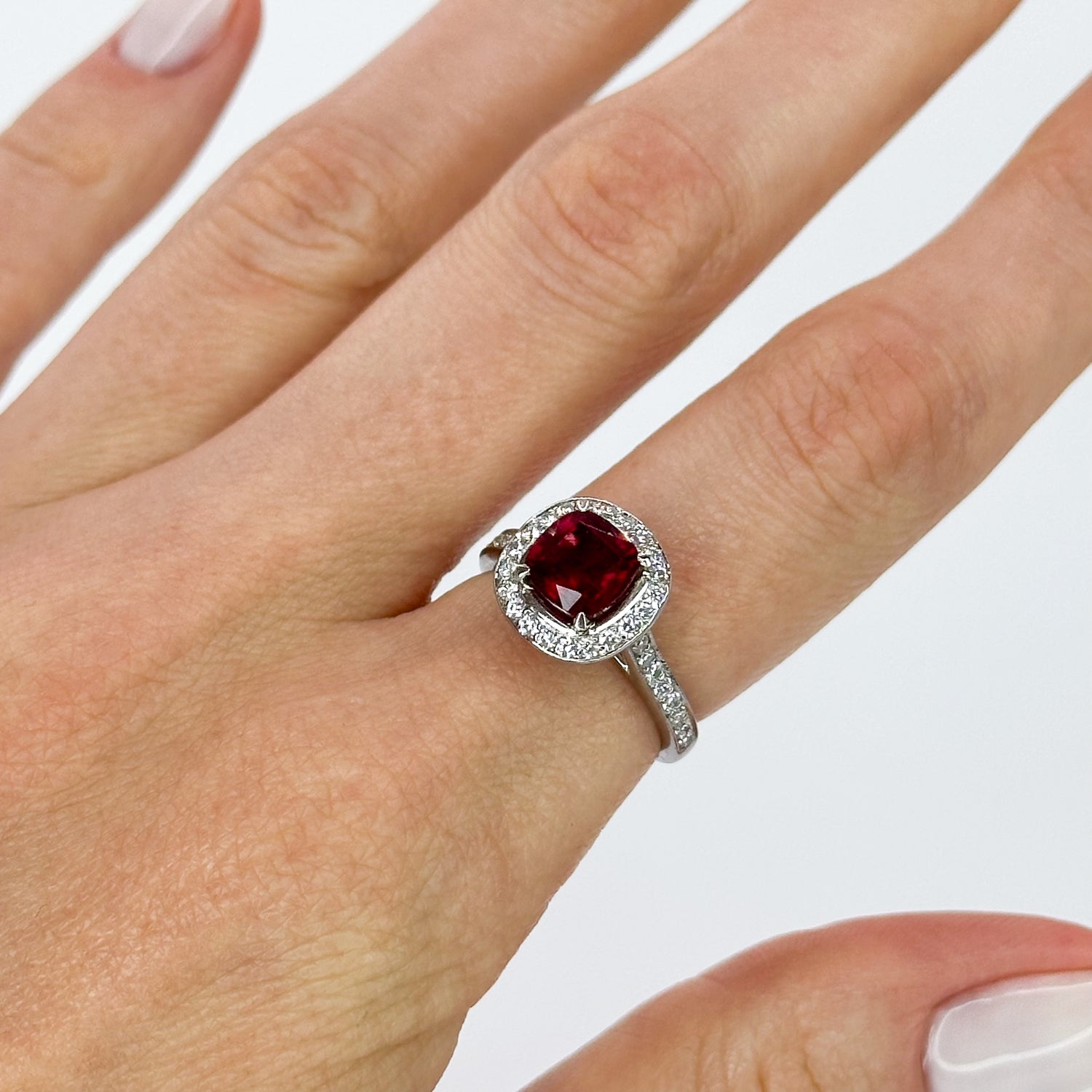 Ruby Ring with Diamond Halo in Platinum