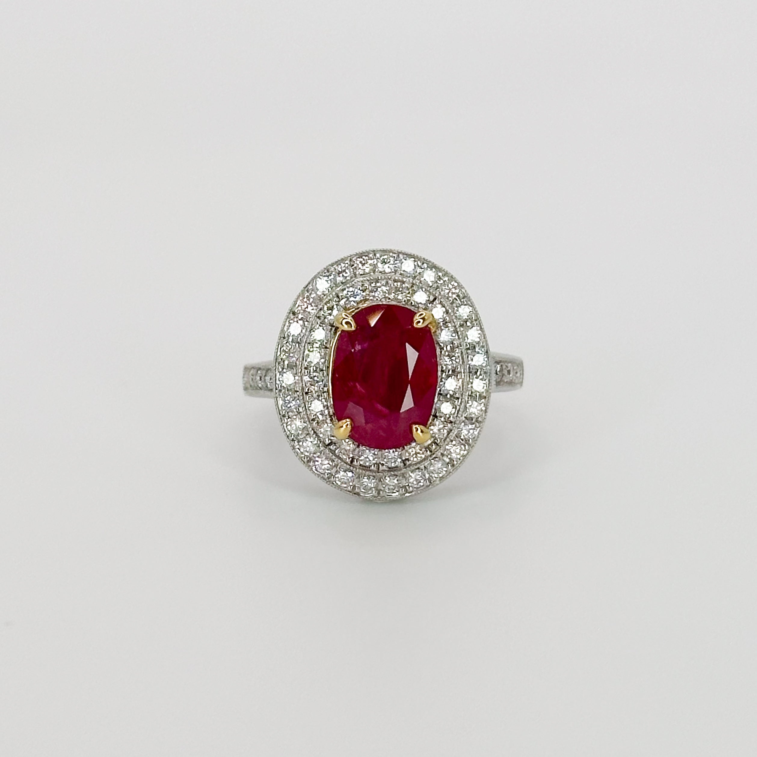 Oval Cut Ruby Ring with Double Halo in White Gold