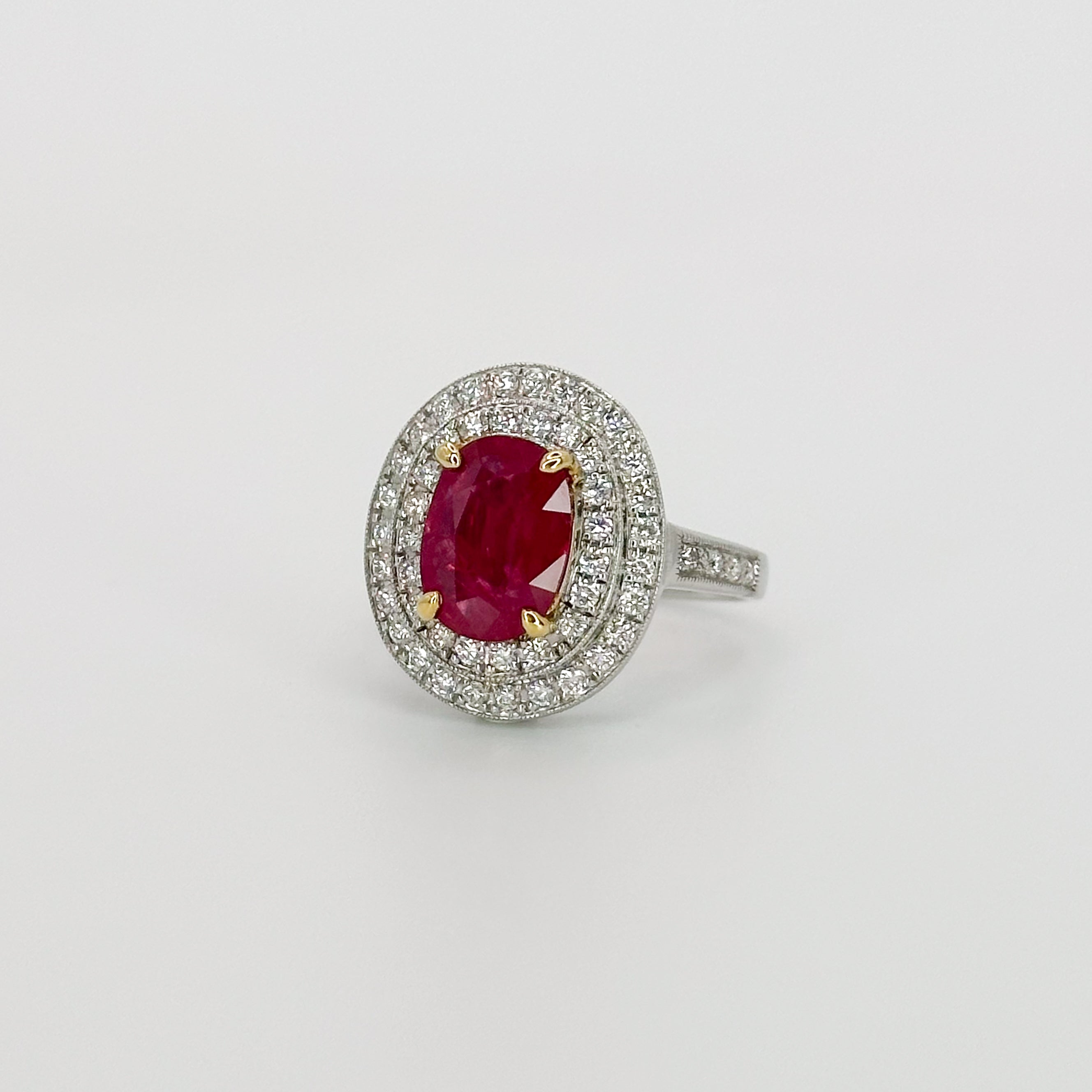 Oval Cut Ruby Ring with Double Halo in White Gold