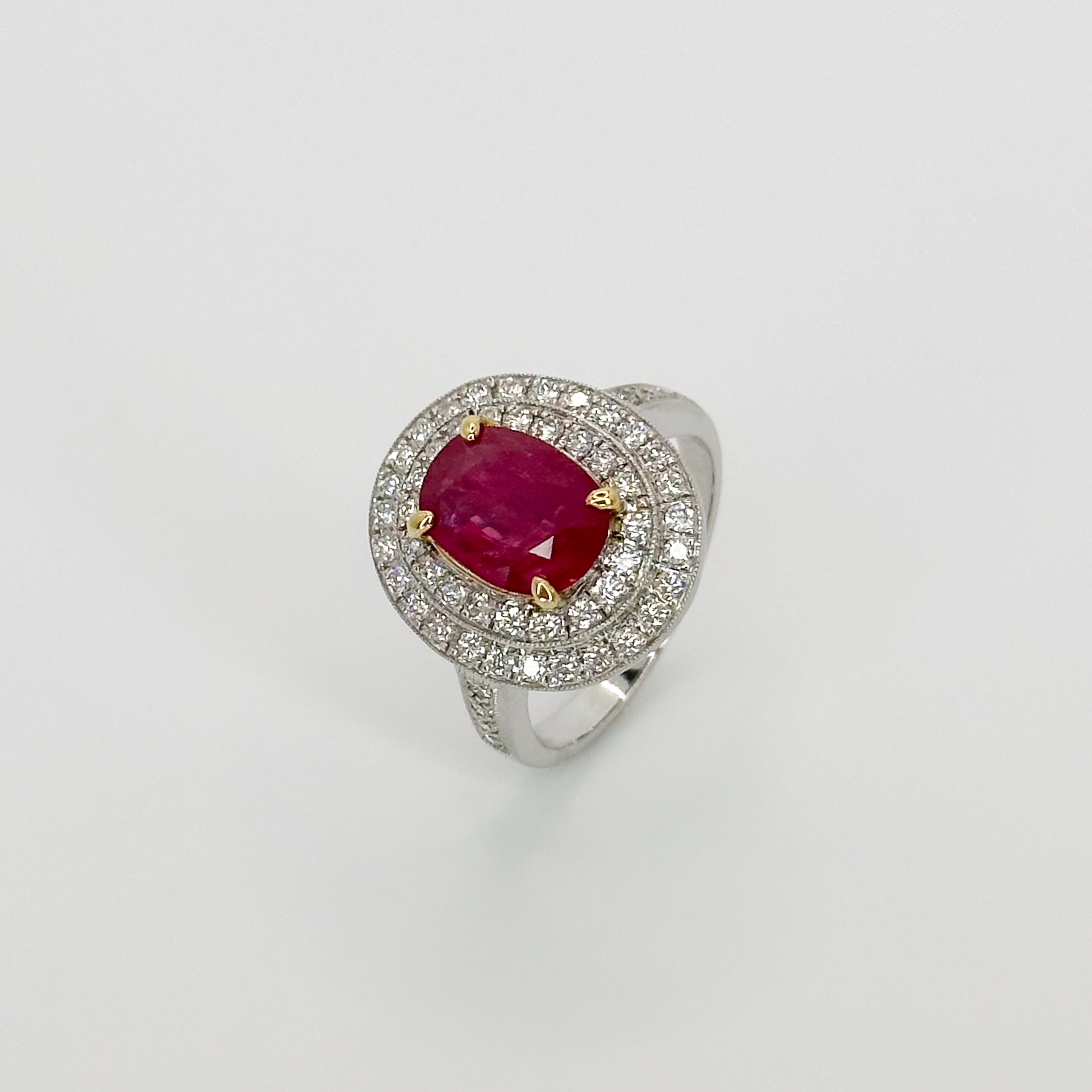 Oval Cut Ruby Ring with Double Halo in White Gold