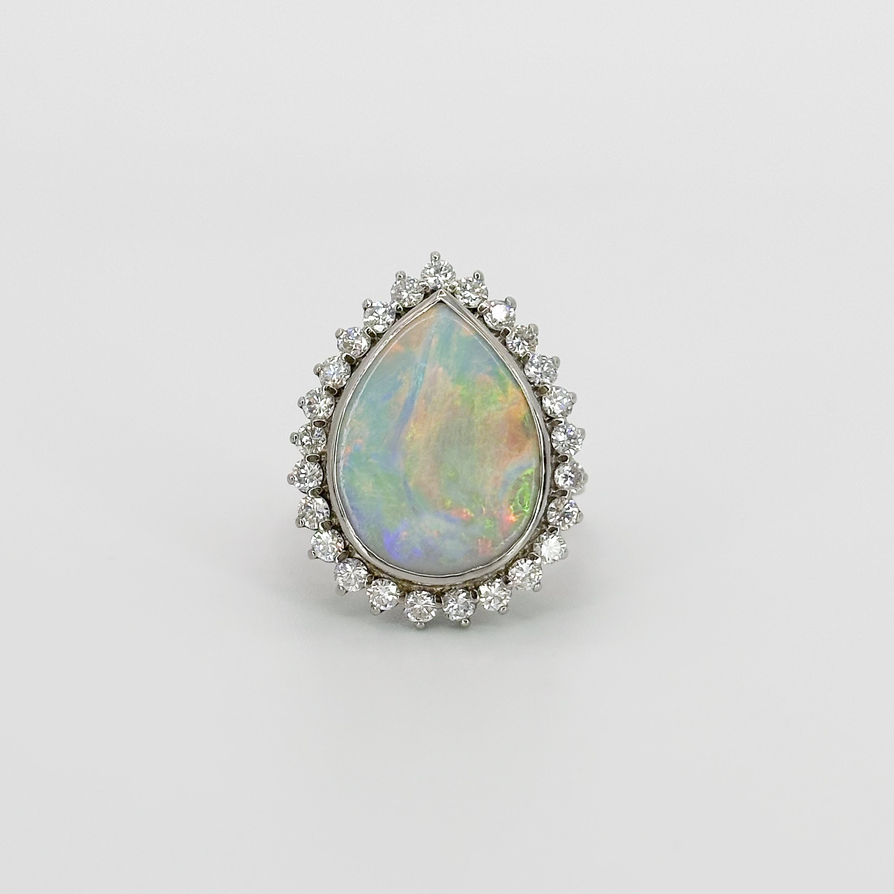 Opal Ring with Diamond Halo in White Gold