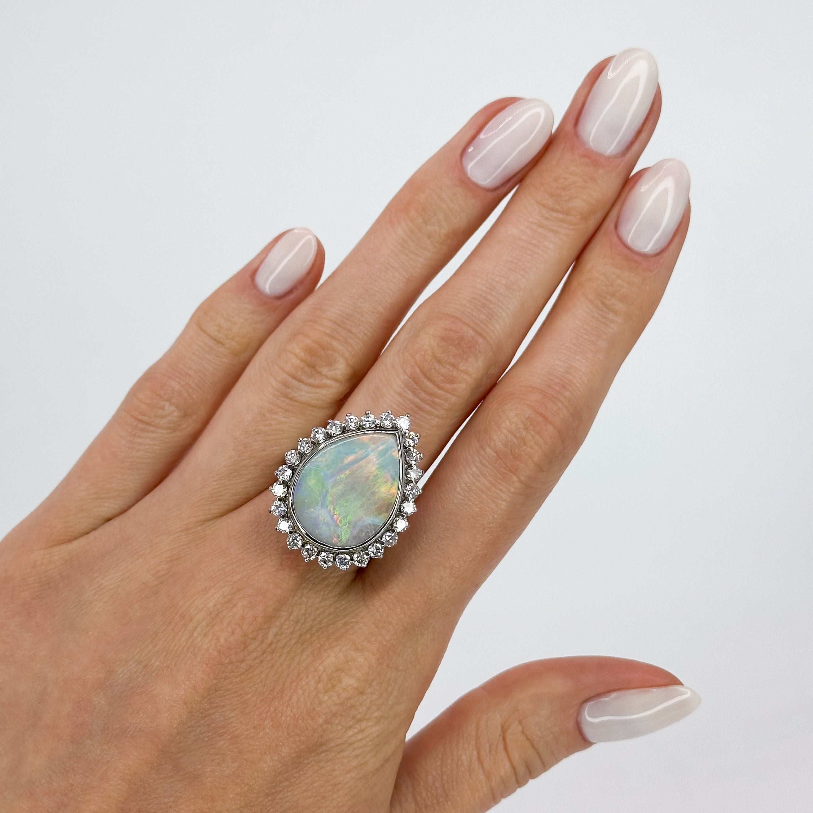 Opal Ring with Diamond Halo in White Gold