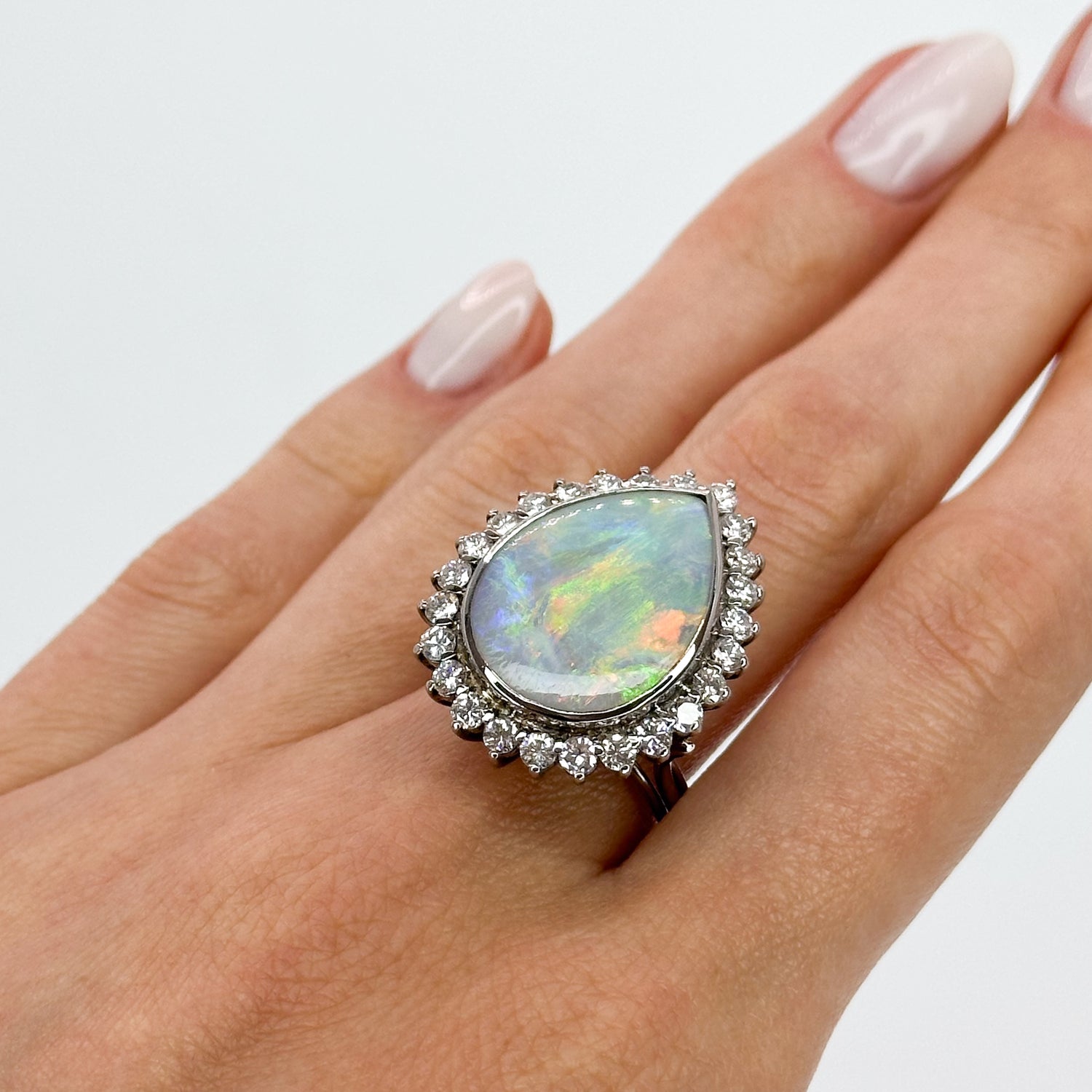 Opal Ring with Diamond Halo in White Gold