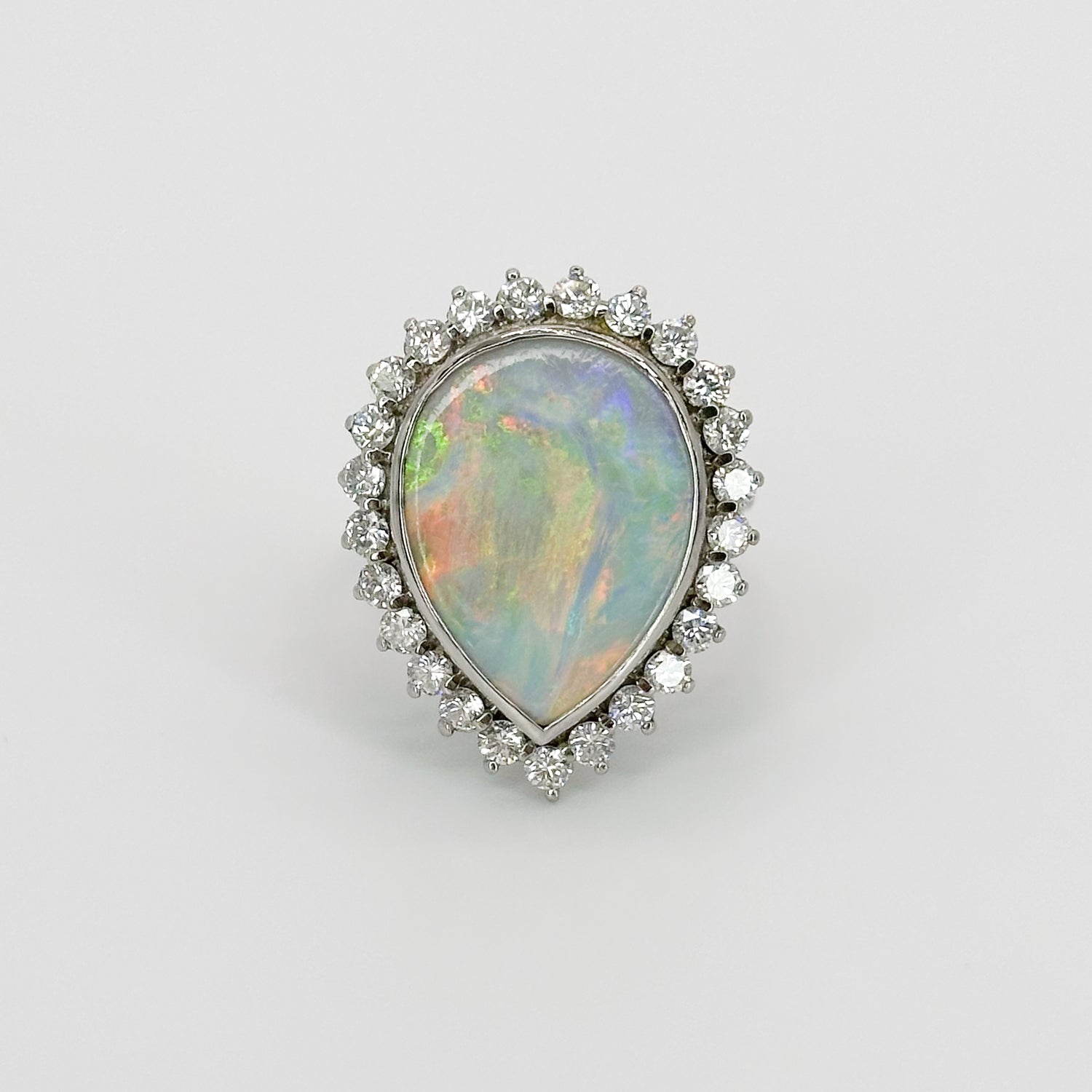 Opal Ring with Diamond Halo in White Gold