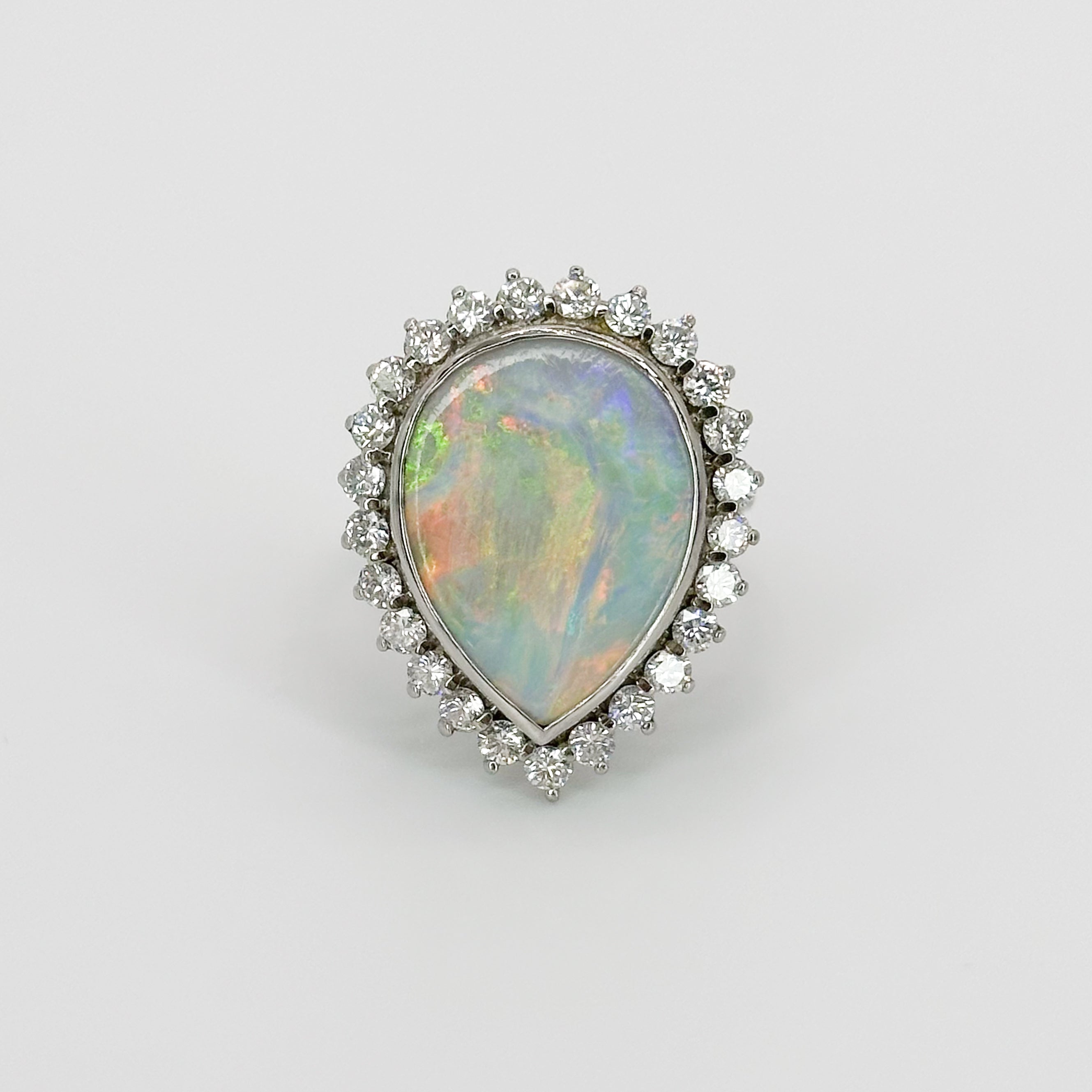 Opal Ring with Diamond Halo in White Gold