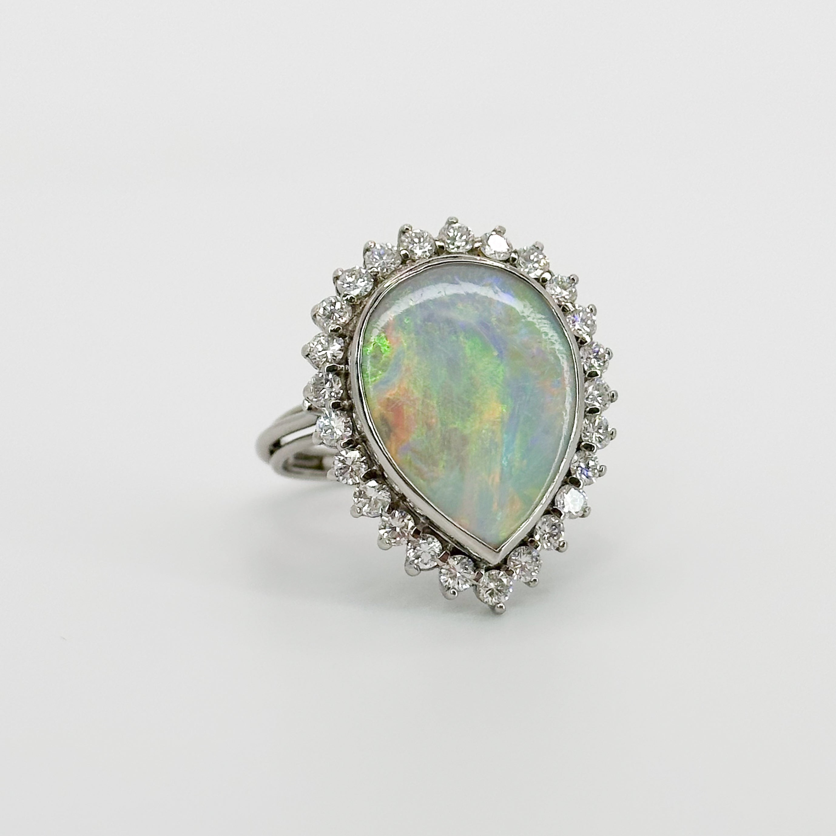 Opal Ring with Diamond Halo in White Gold