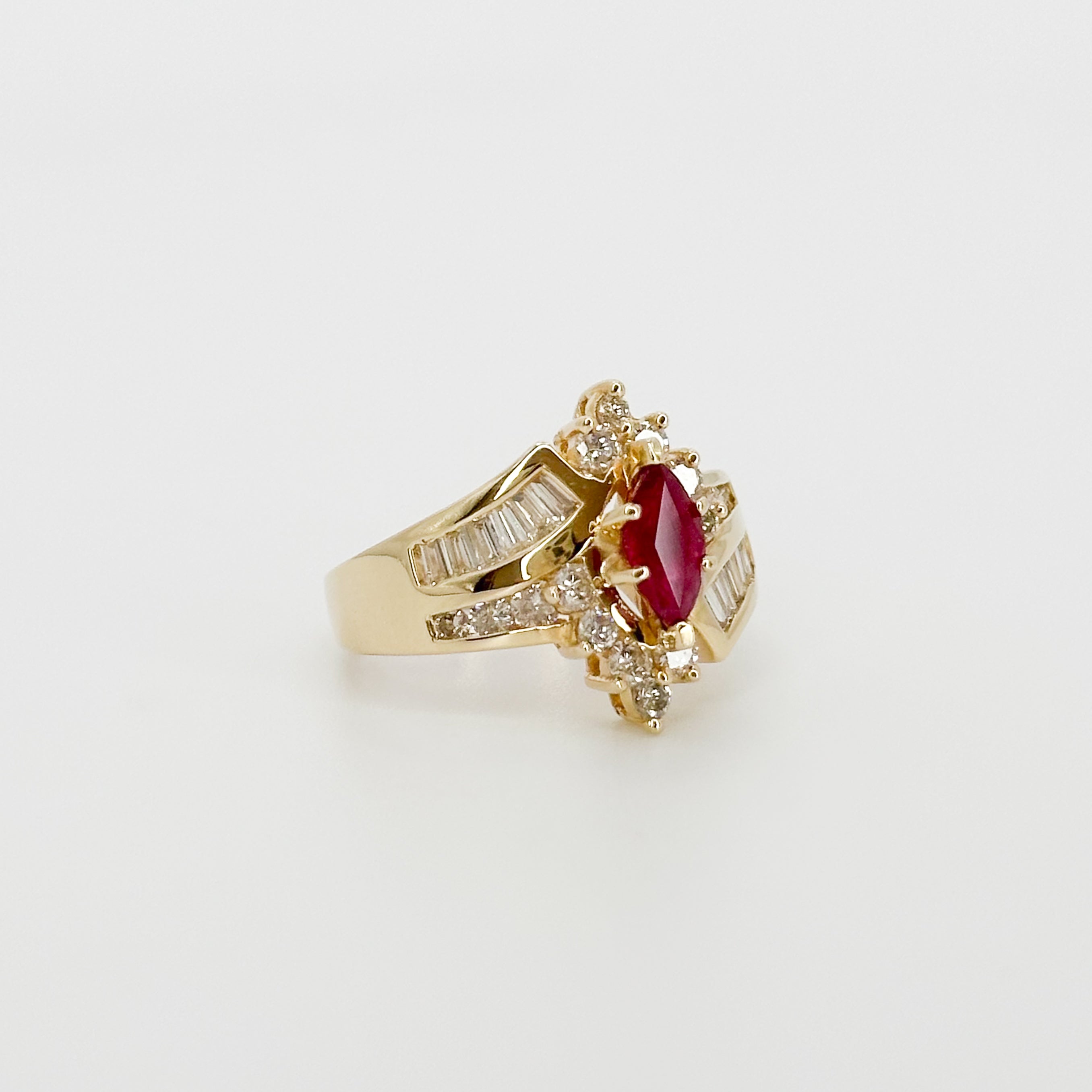 Marquise Cut Ruby Ring with Diamonds in Yellow Gold