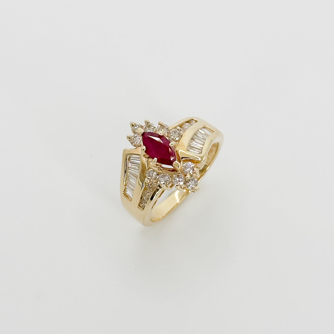 Marquise Cut Ruby Ring with Diamonds in Yellow Gold