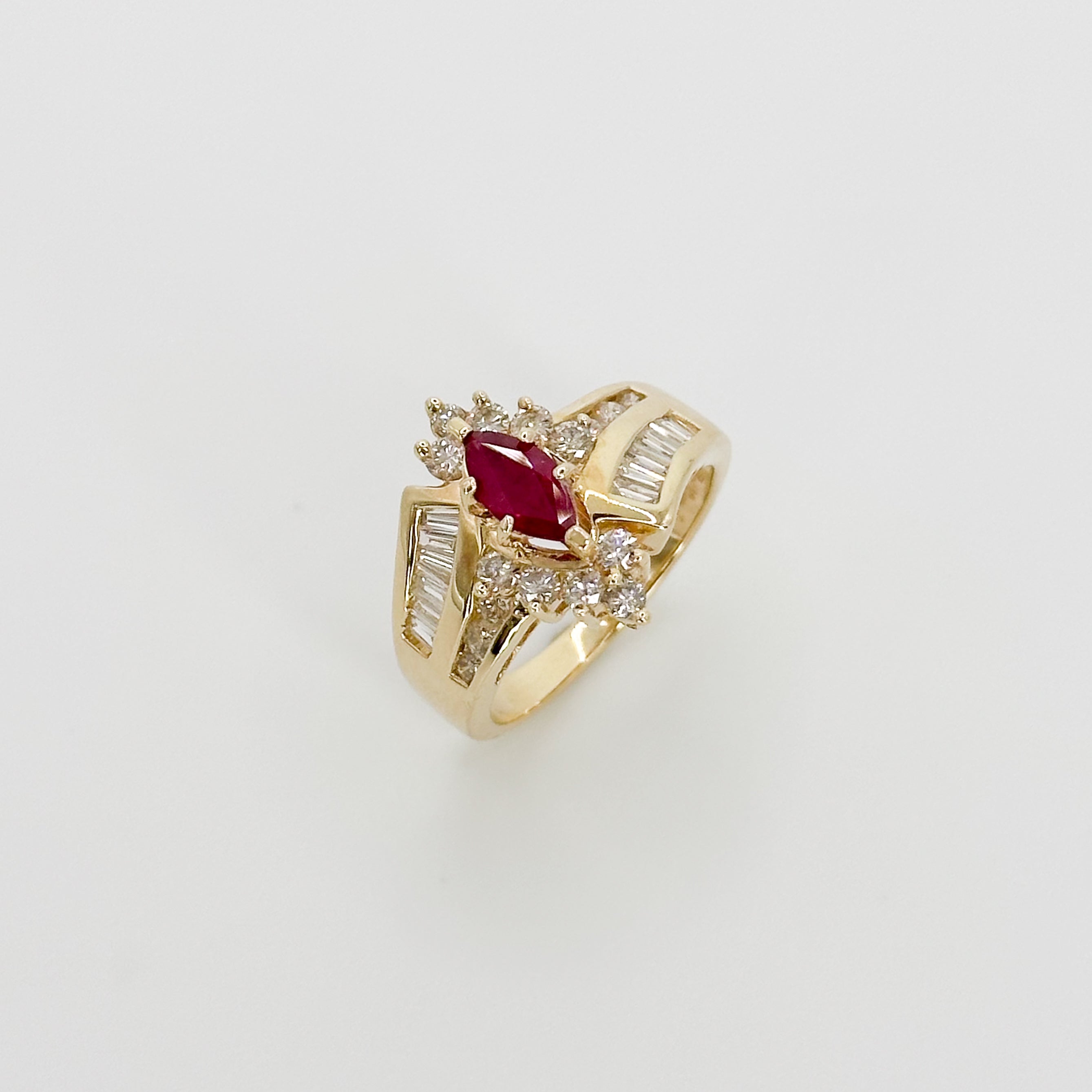 Marquise Cut Ruby Ring with Diamonds in Yellow Gold