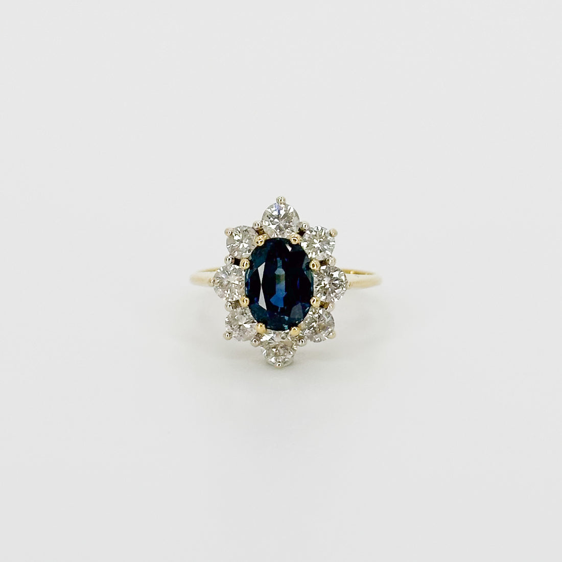 Oval Cut Deep Blue Sapphire Ring in Yellow Gold