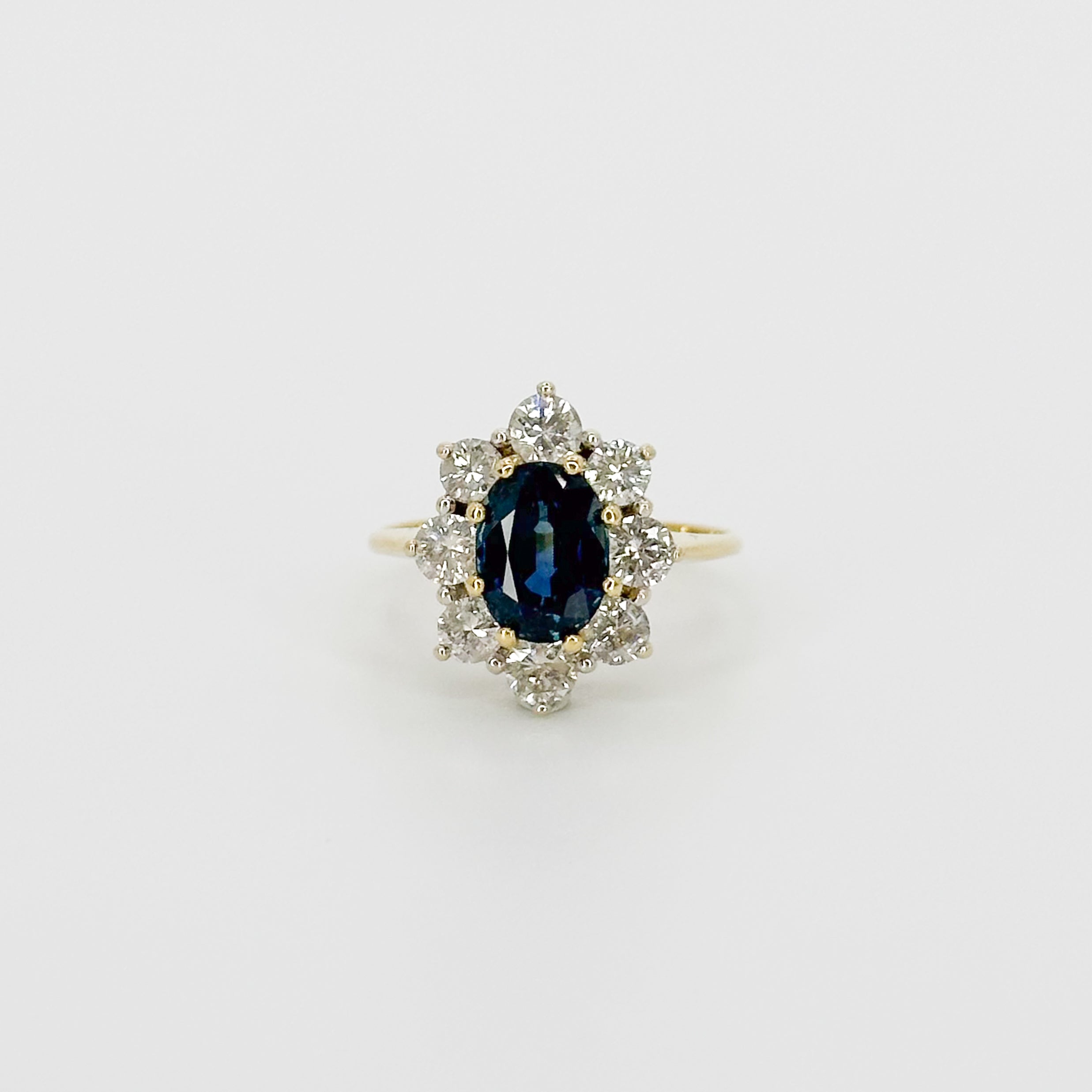 Oval Cut Deep Blue Sapphire Ring in Yellow Gold