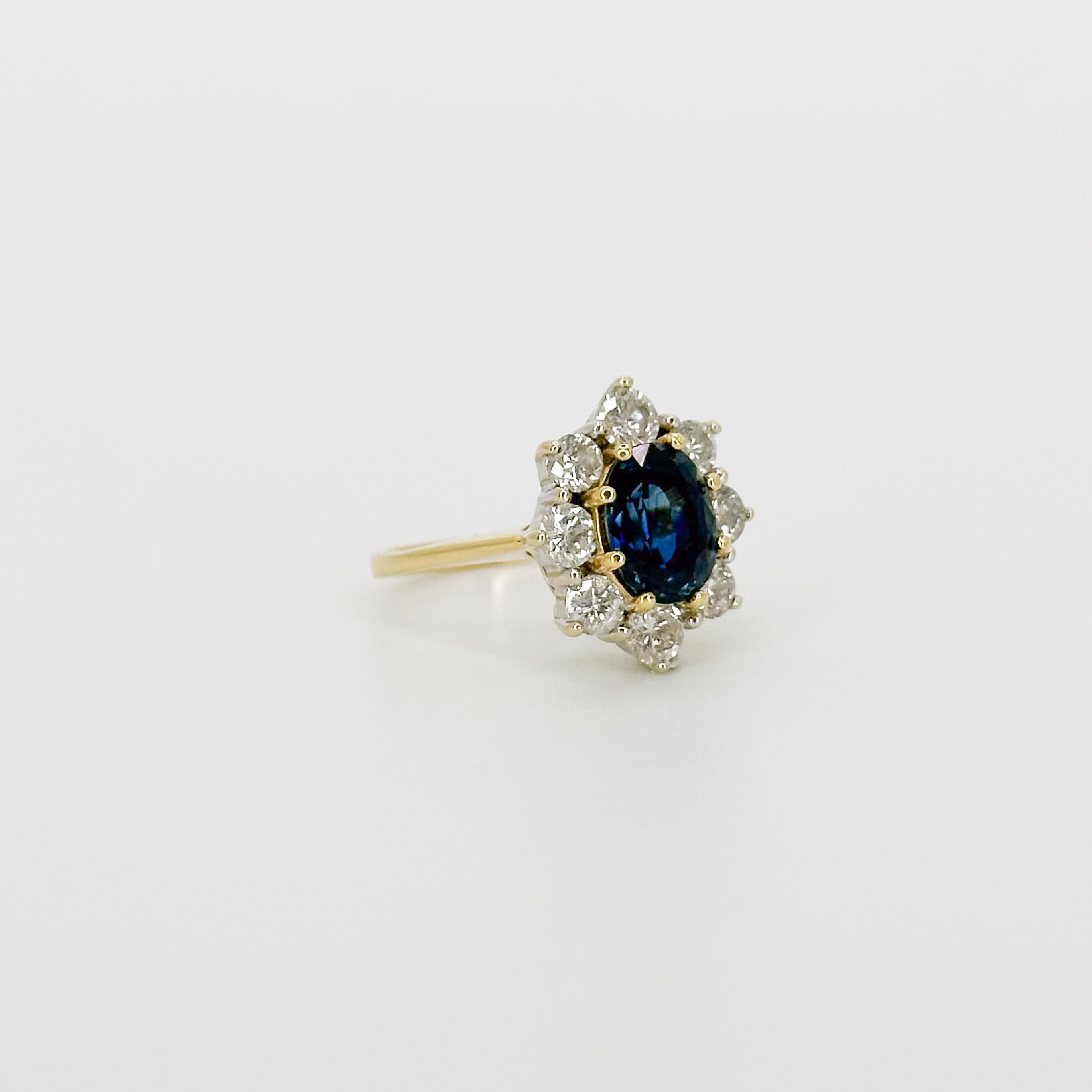 Oval Cut Deep Blue Sapphire Ring in Yellow Gold