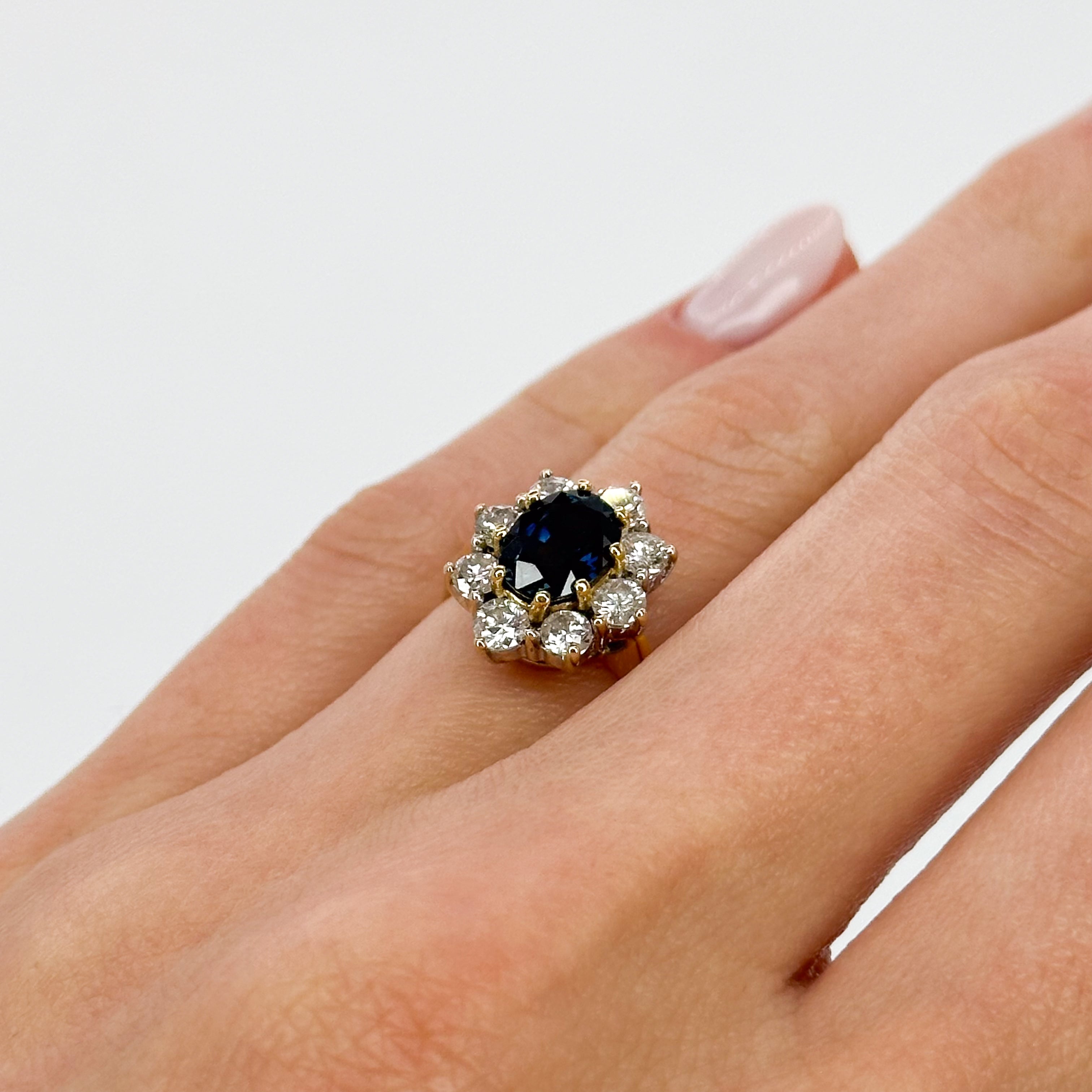 Oval Cut Deep Blue Sapphire Ring in Yellow Gold