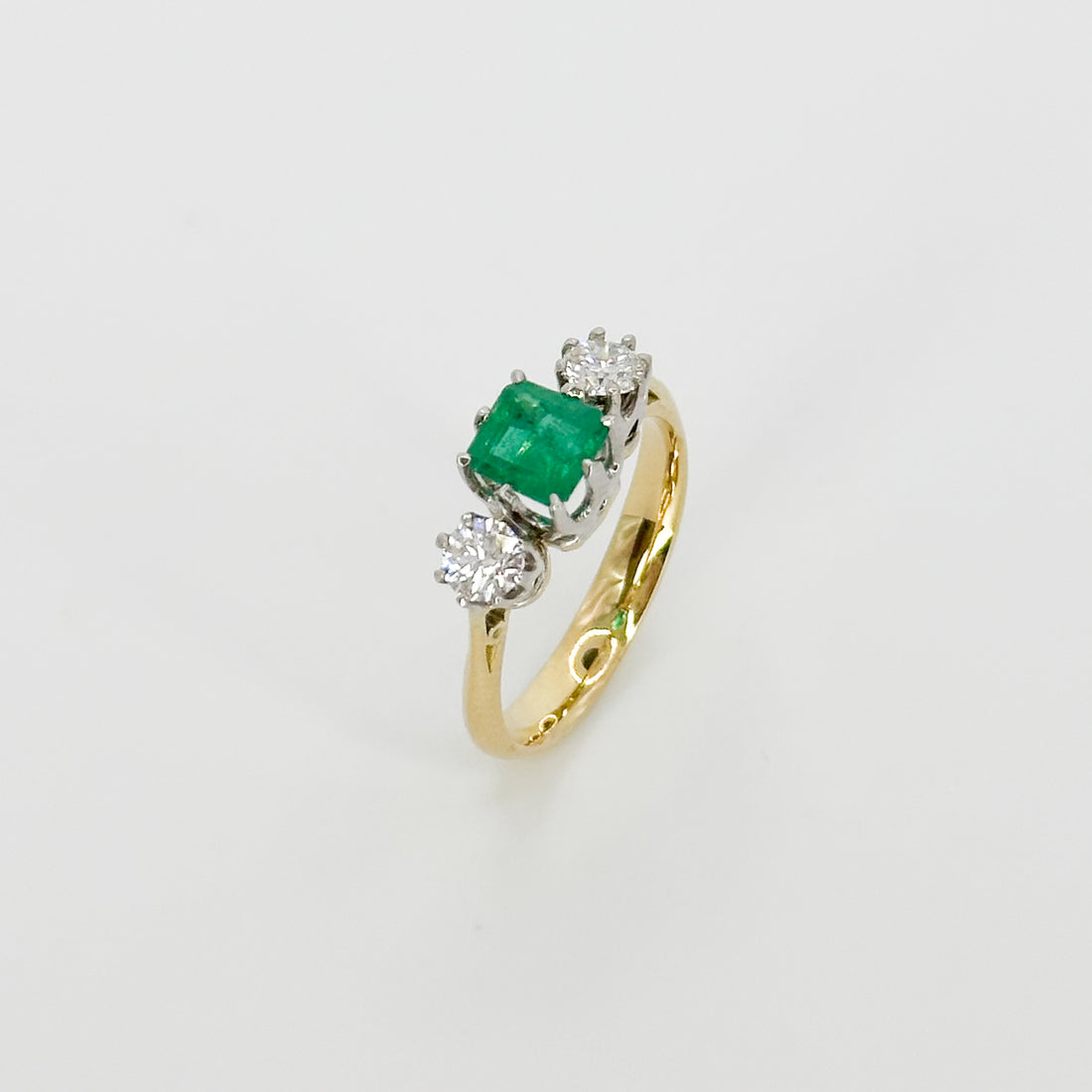 Emerald and Diamond Trilogy Ring in Yellow Gold