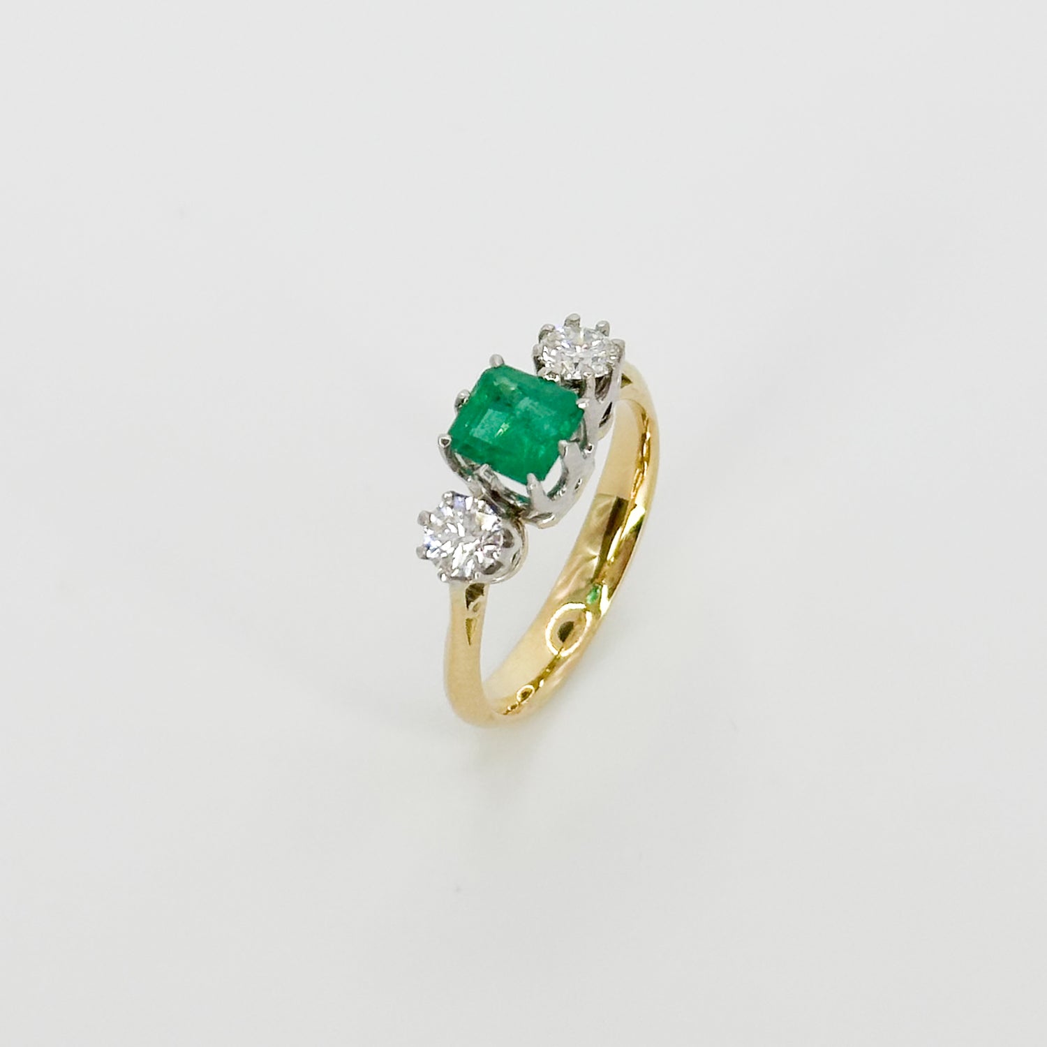 Emerald and Diamond Trilogy Ring in Yellow Gold