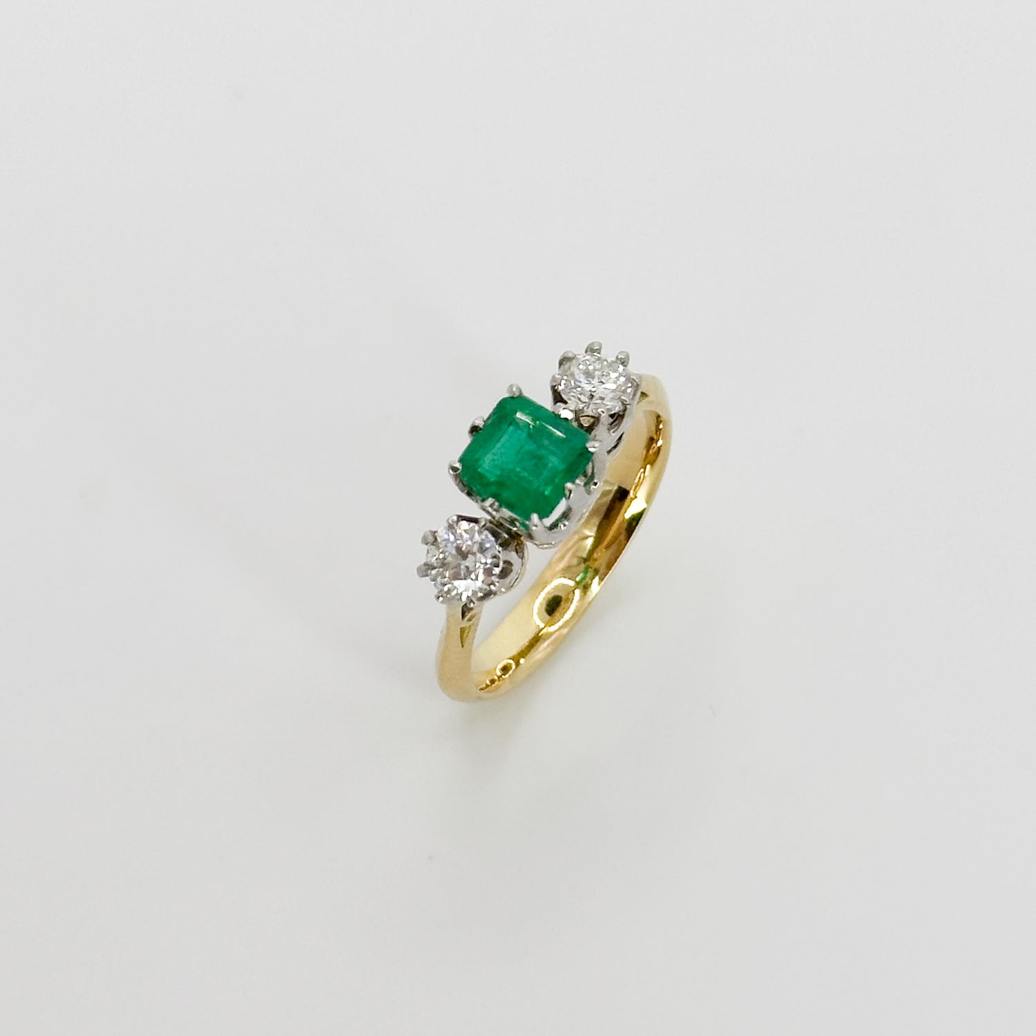 Emerald and Diamond Trilogy Ring in Yellow Gold