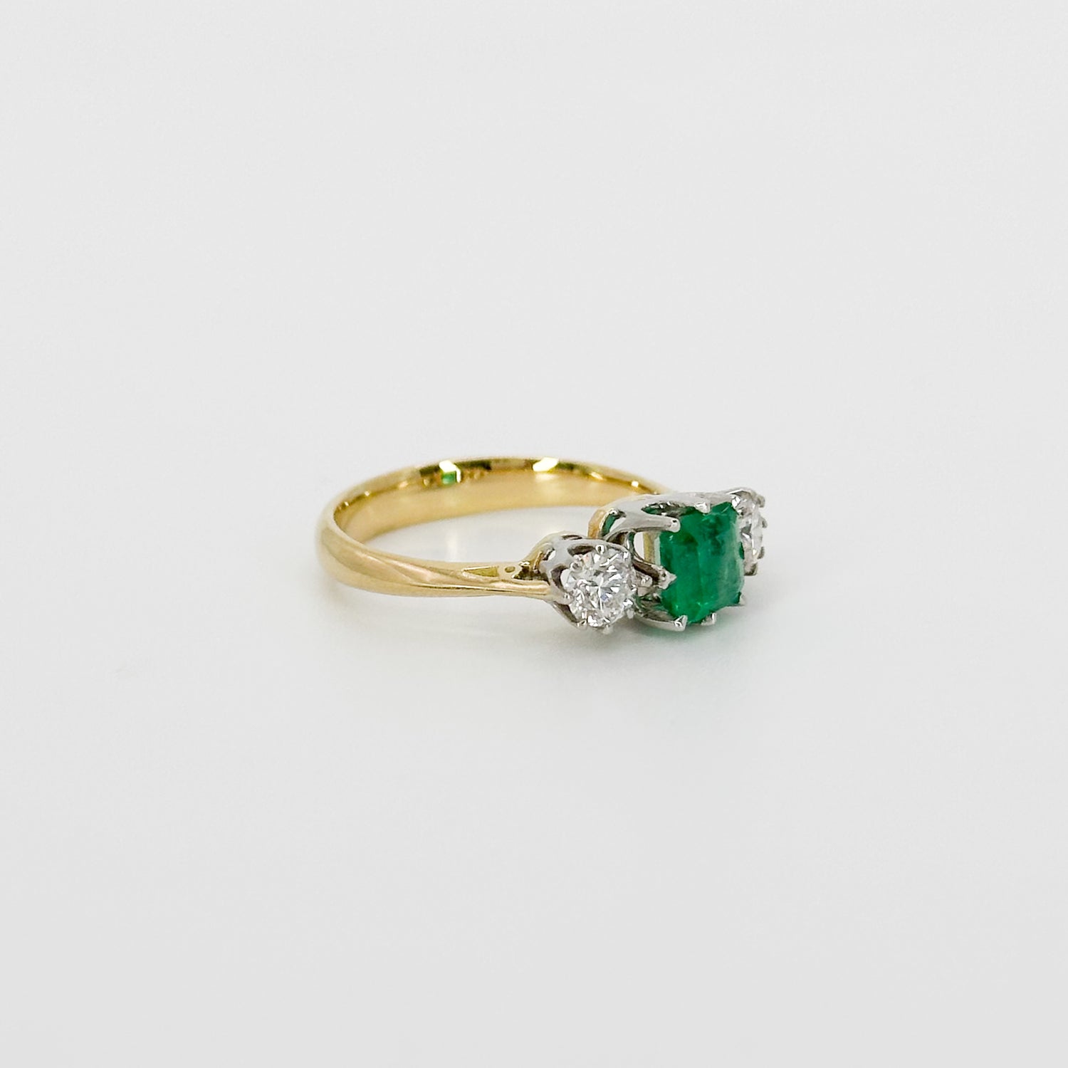 Emerald and Diamond Trilogy Ring in Yellow Gold