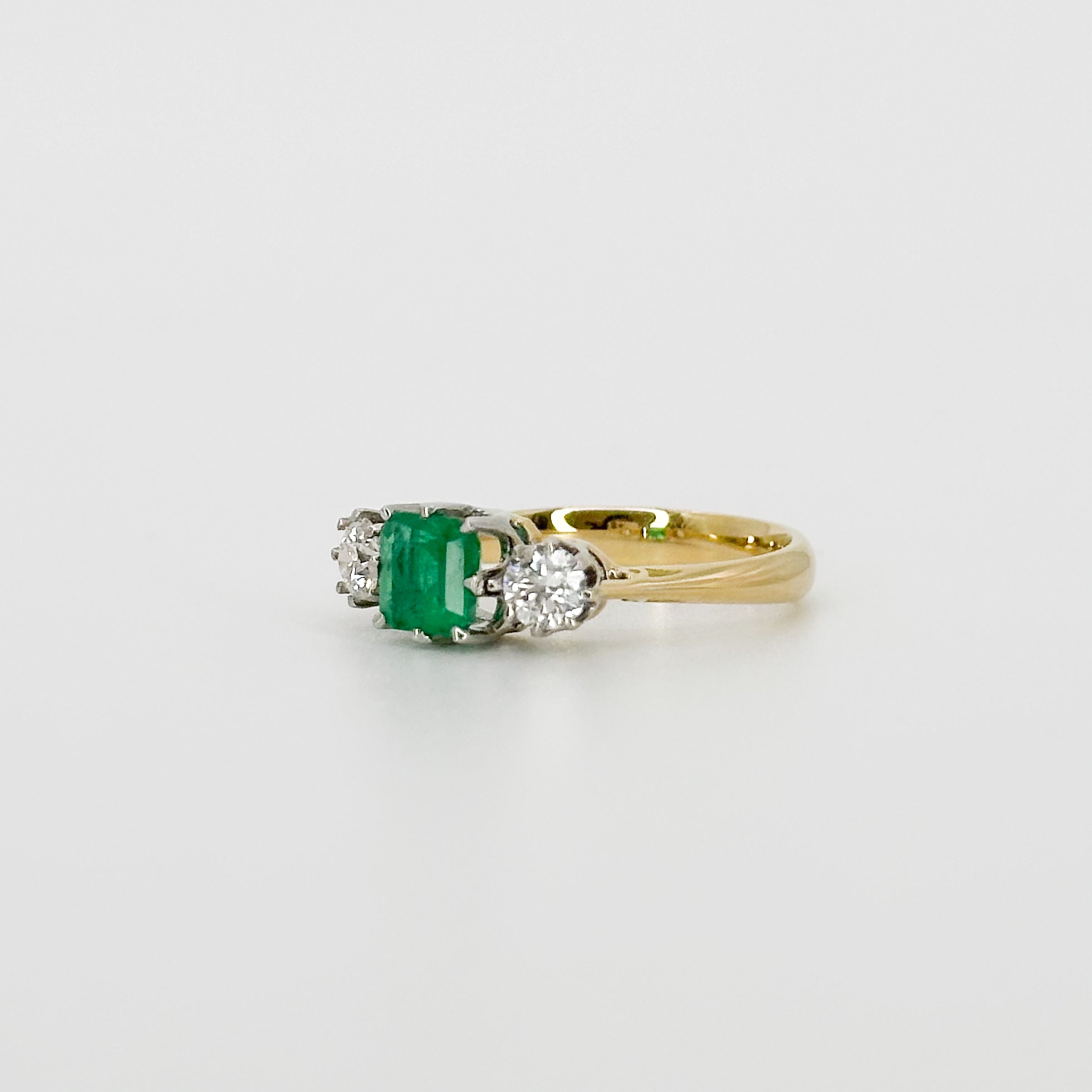 Emerald and Diamond Trilogy Ring in Yellow Gold