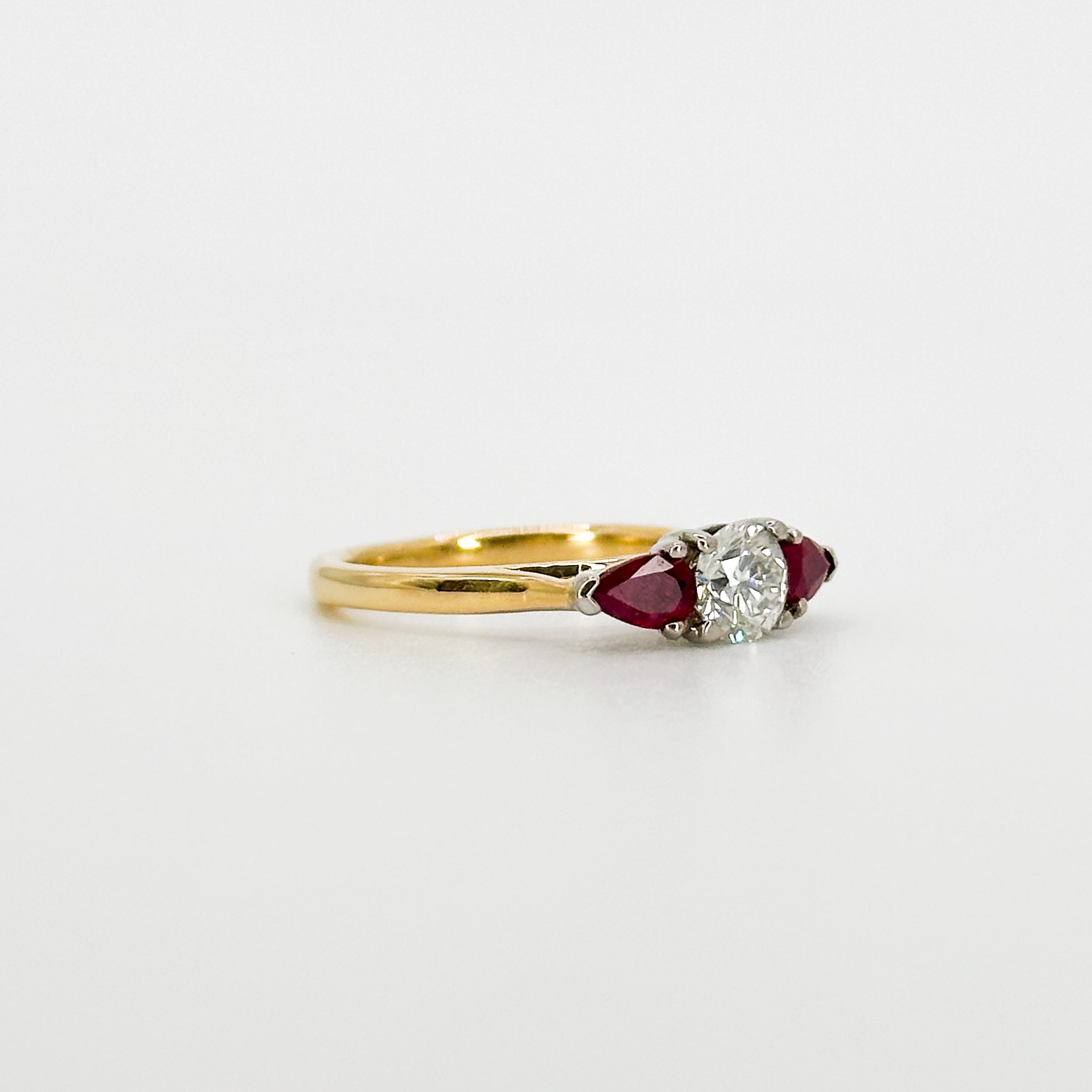 Diamond and Ruby Trilogy Ring in Yellow Gold