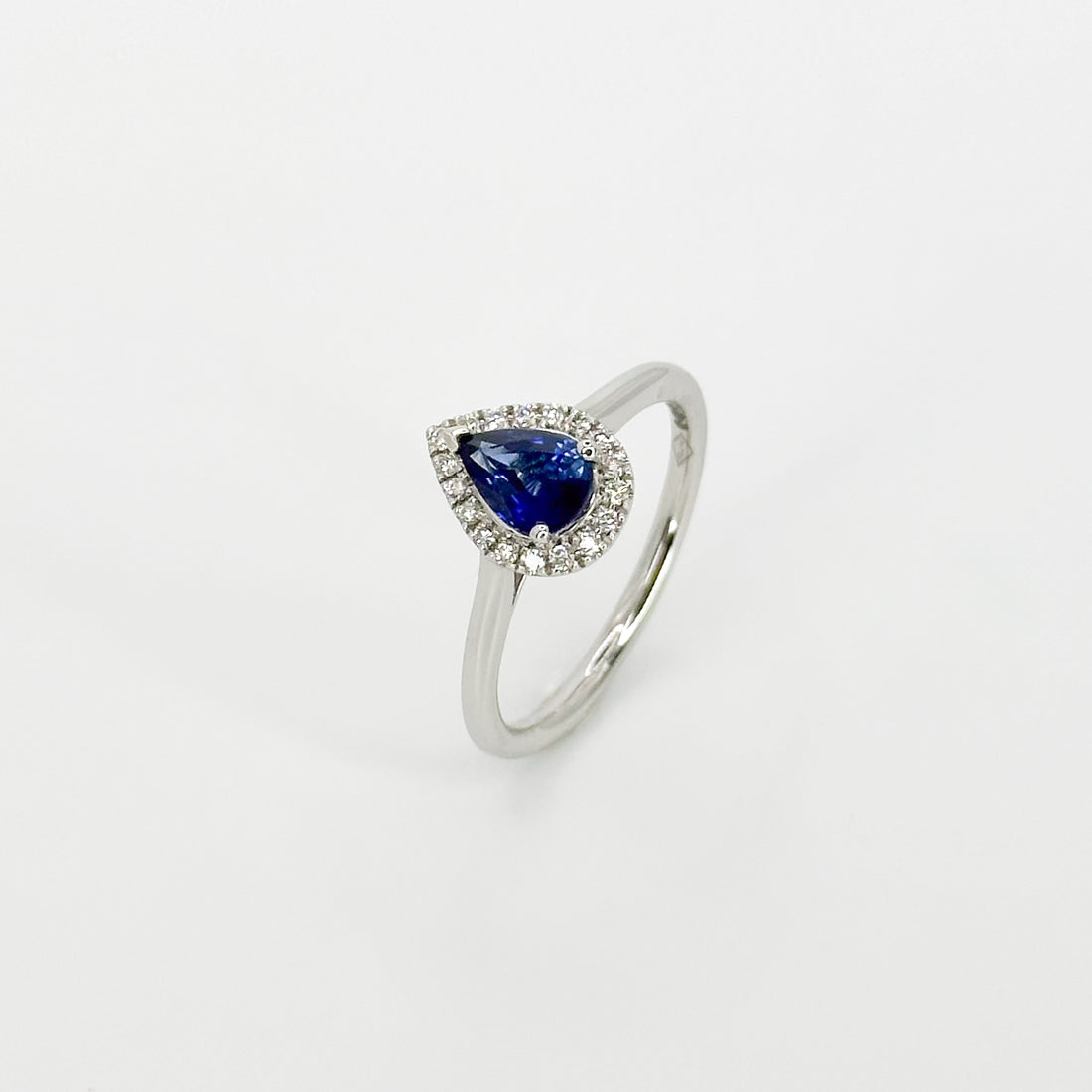 Pear Shape Blue Sapphire Ring with Diamond Halo