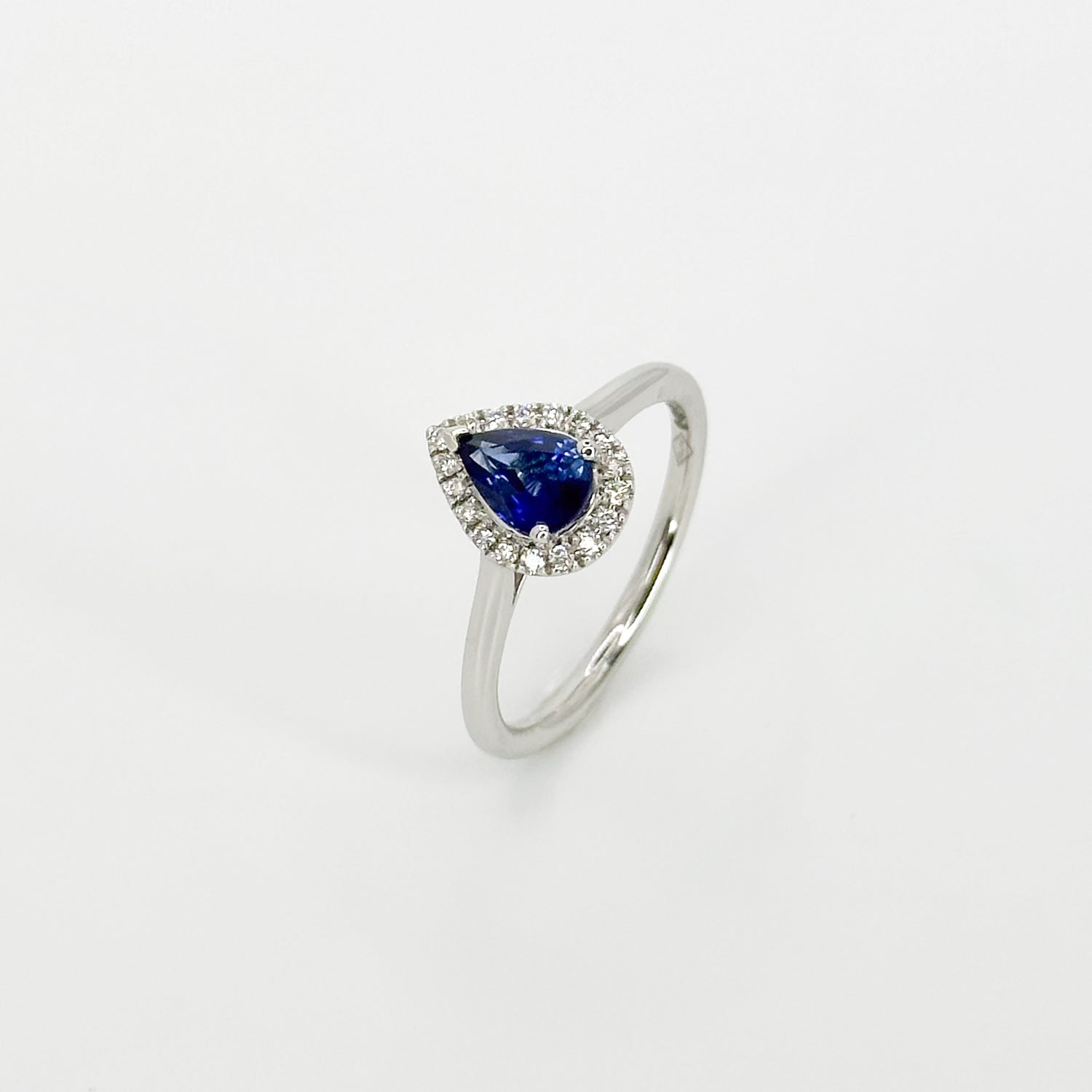 Pear Shape Blue Sapphire Ring with Diamond Halo