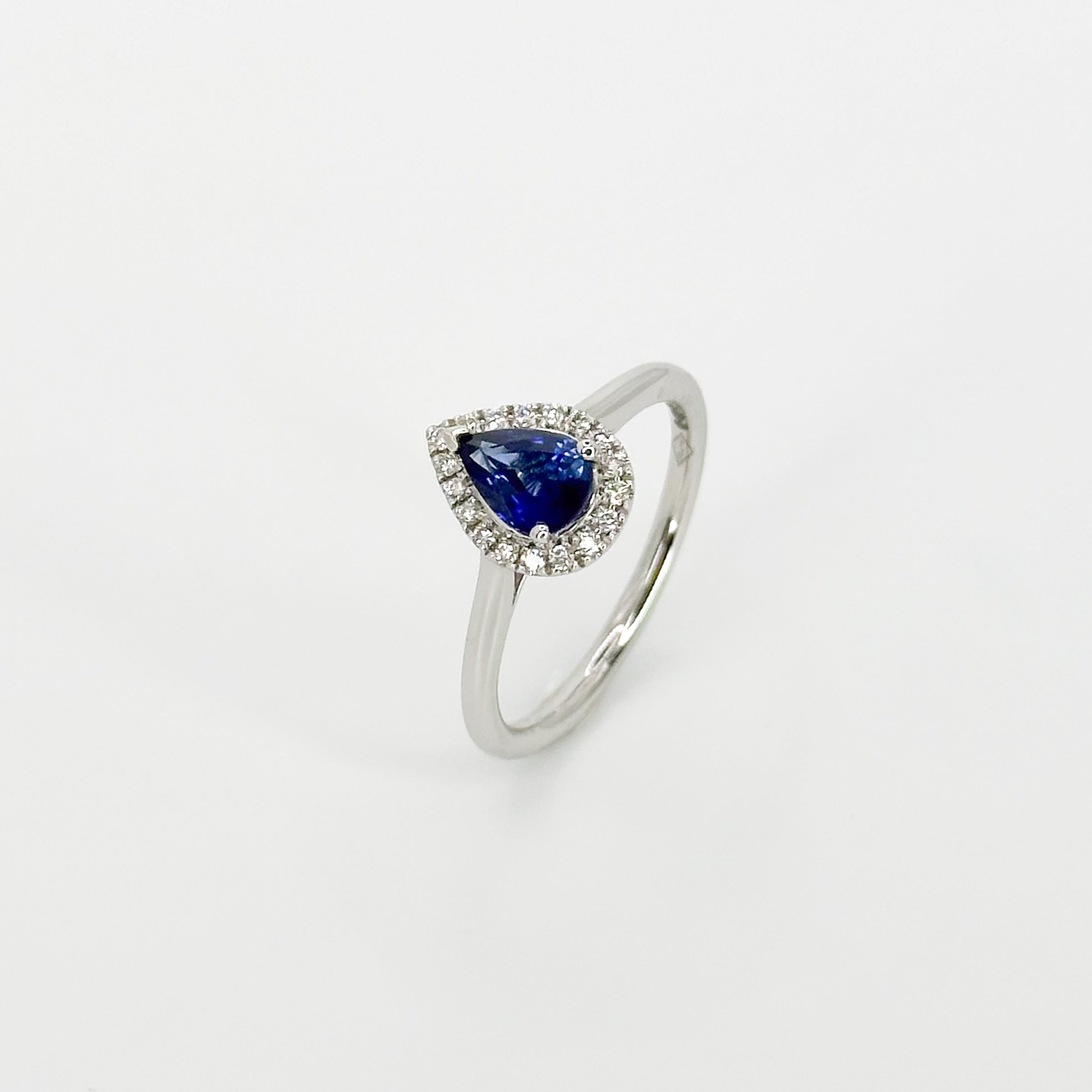 Pear Shape Blue Sapphire Ring with Diamond Halo