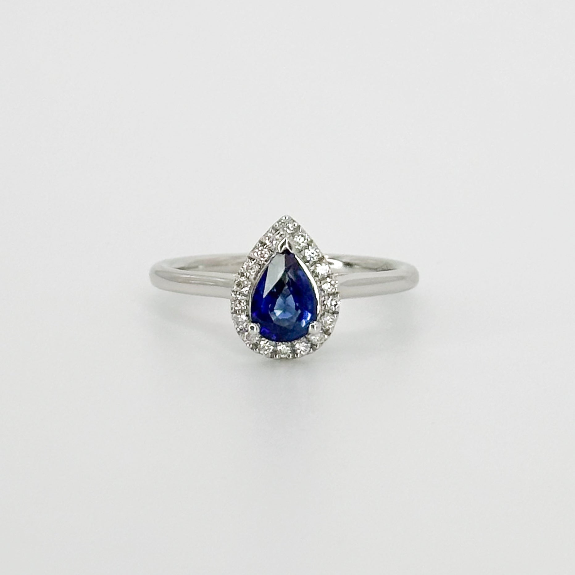 Pear Shape Blue Sapphire Ring with Diamond Halo