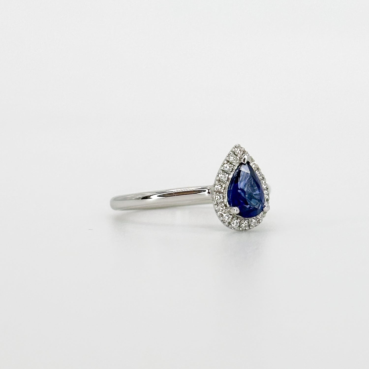 Pear Shape Blue Sapphire Ring with Diamond Halo