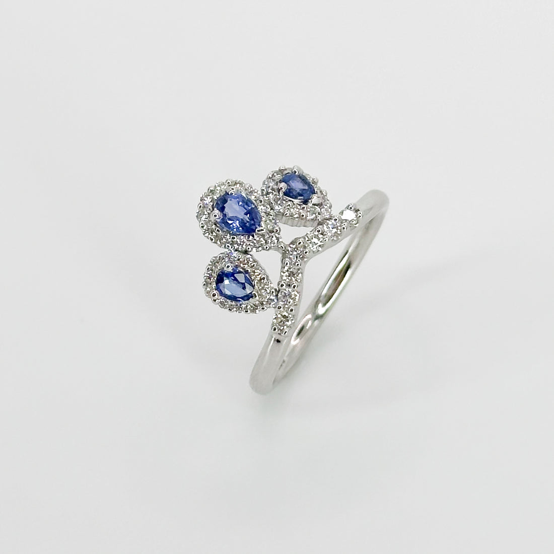 3 Pear Shape Sapphires Ring with Diamonds