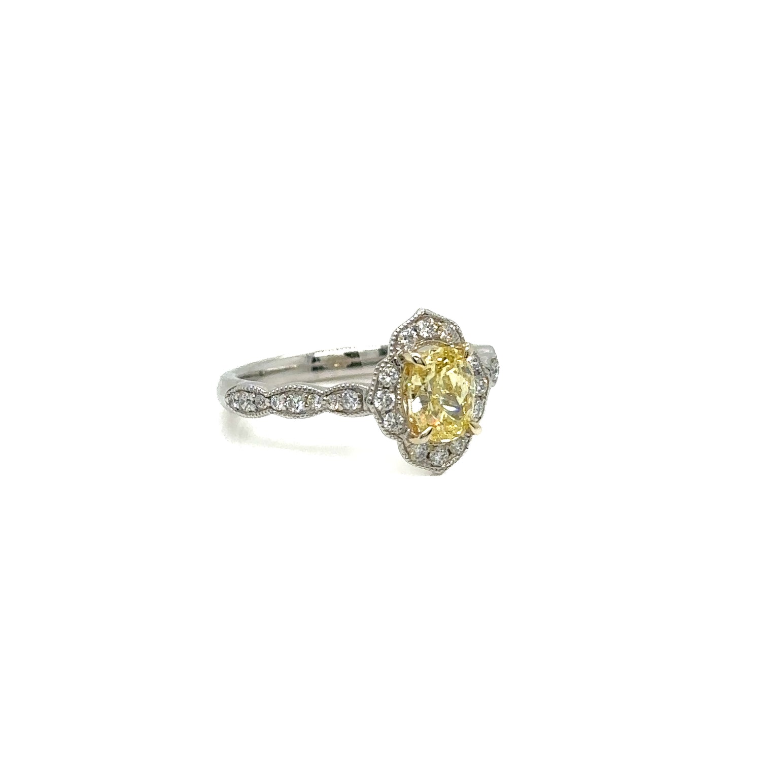 0.91ct Oval Cut Yellow Diamond Ring